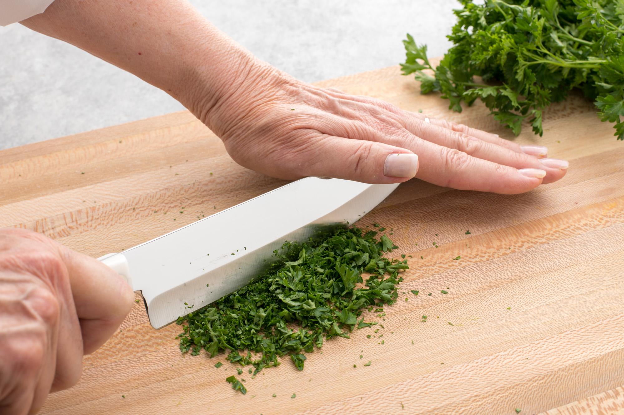 Chopping the herbs with a Petite Chef.