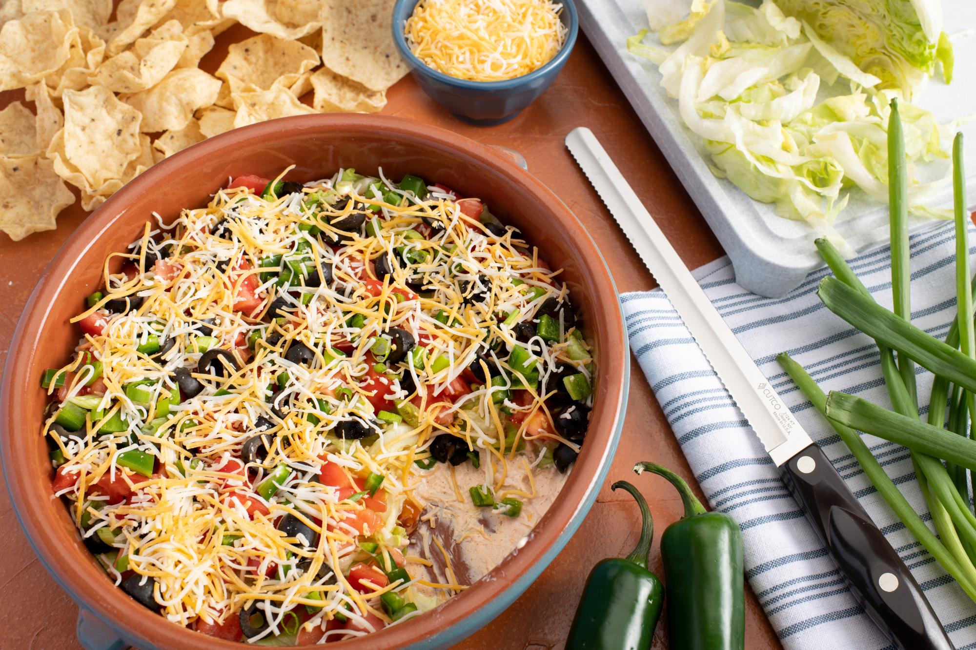Taco Dip With Tomatoes, Jalapeños and Sliced Olives