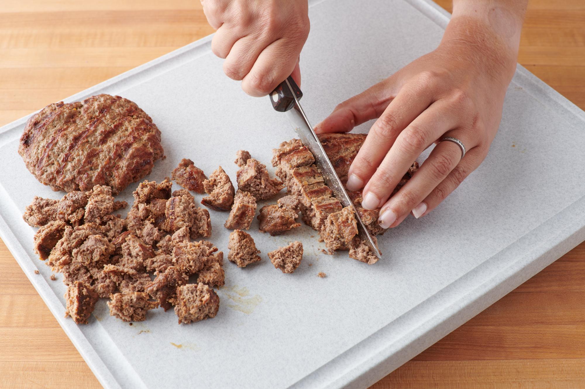 Cutting the burgers with a Trimmer.