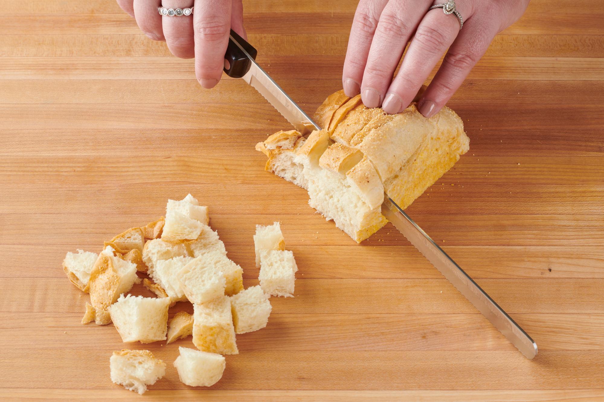 Cubing the bread with a Slicer.