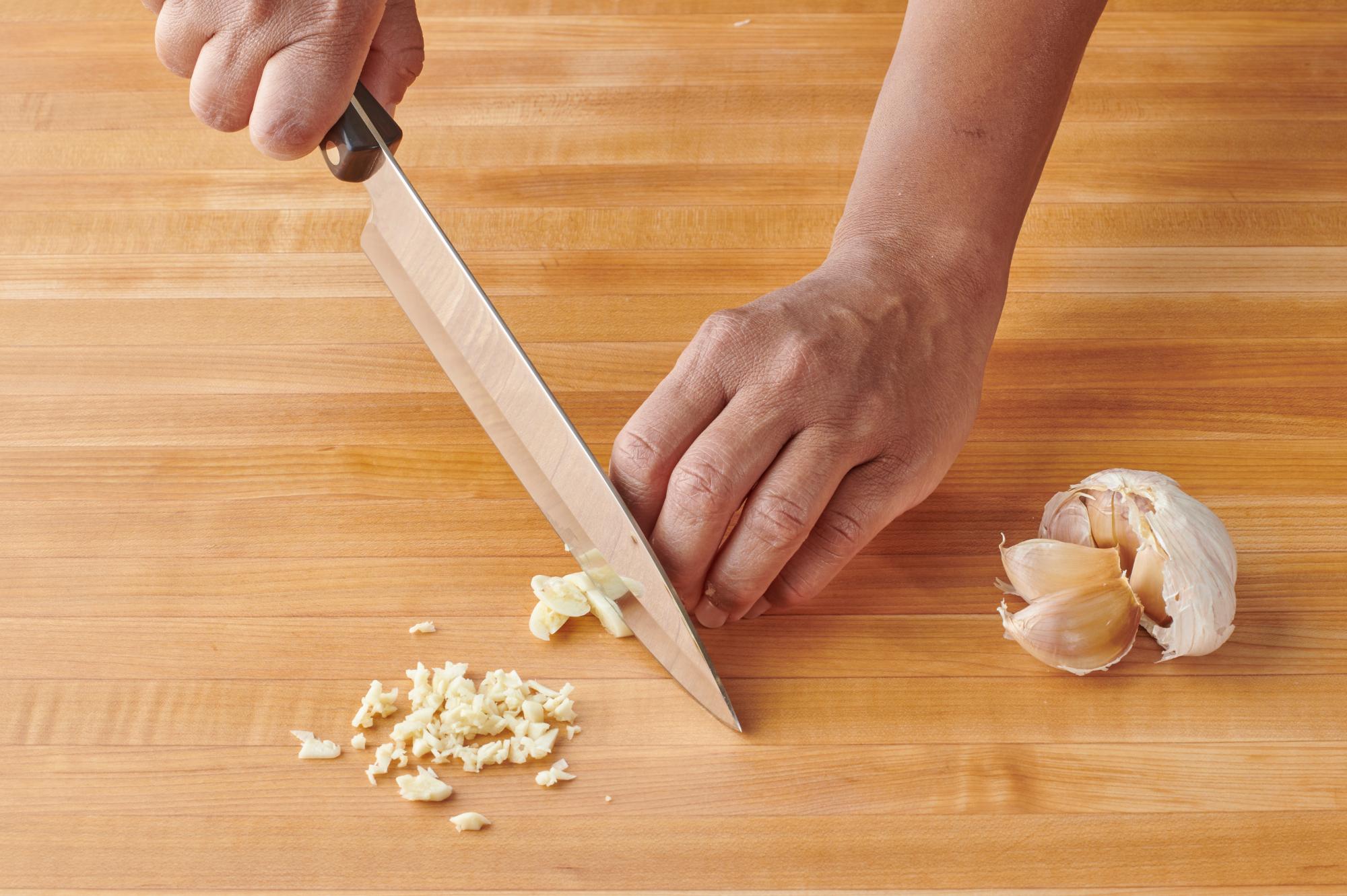 Mincing the garlic with a Petite Chef.