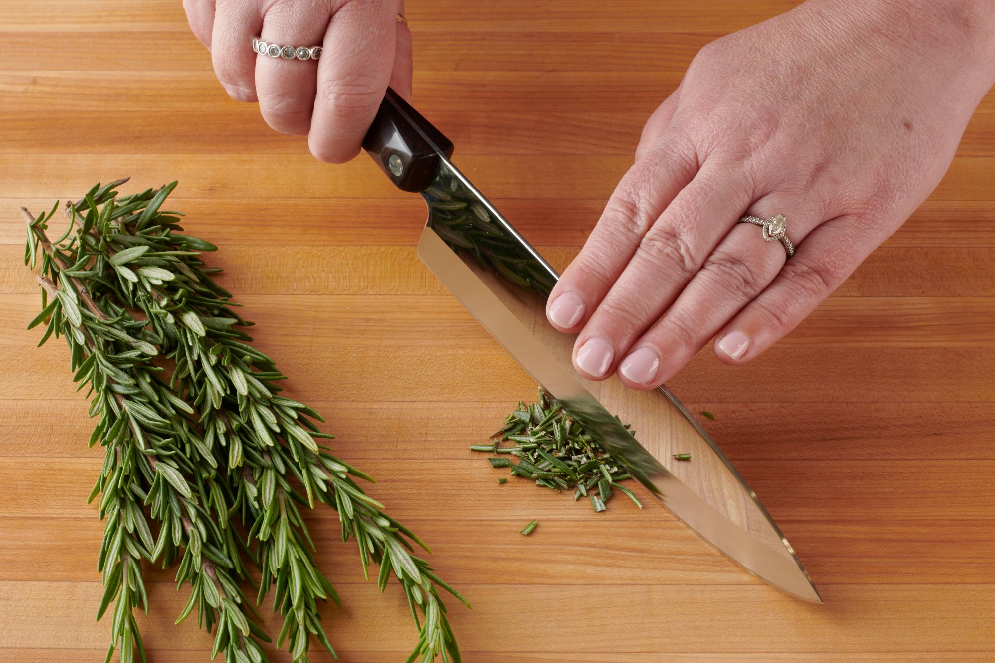 Chopping rosemary with a Petite Chef.