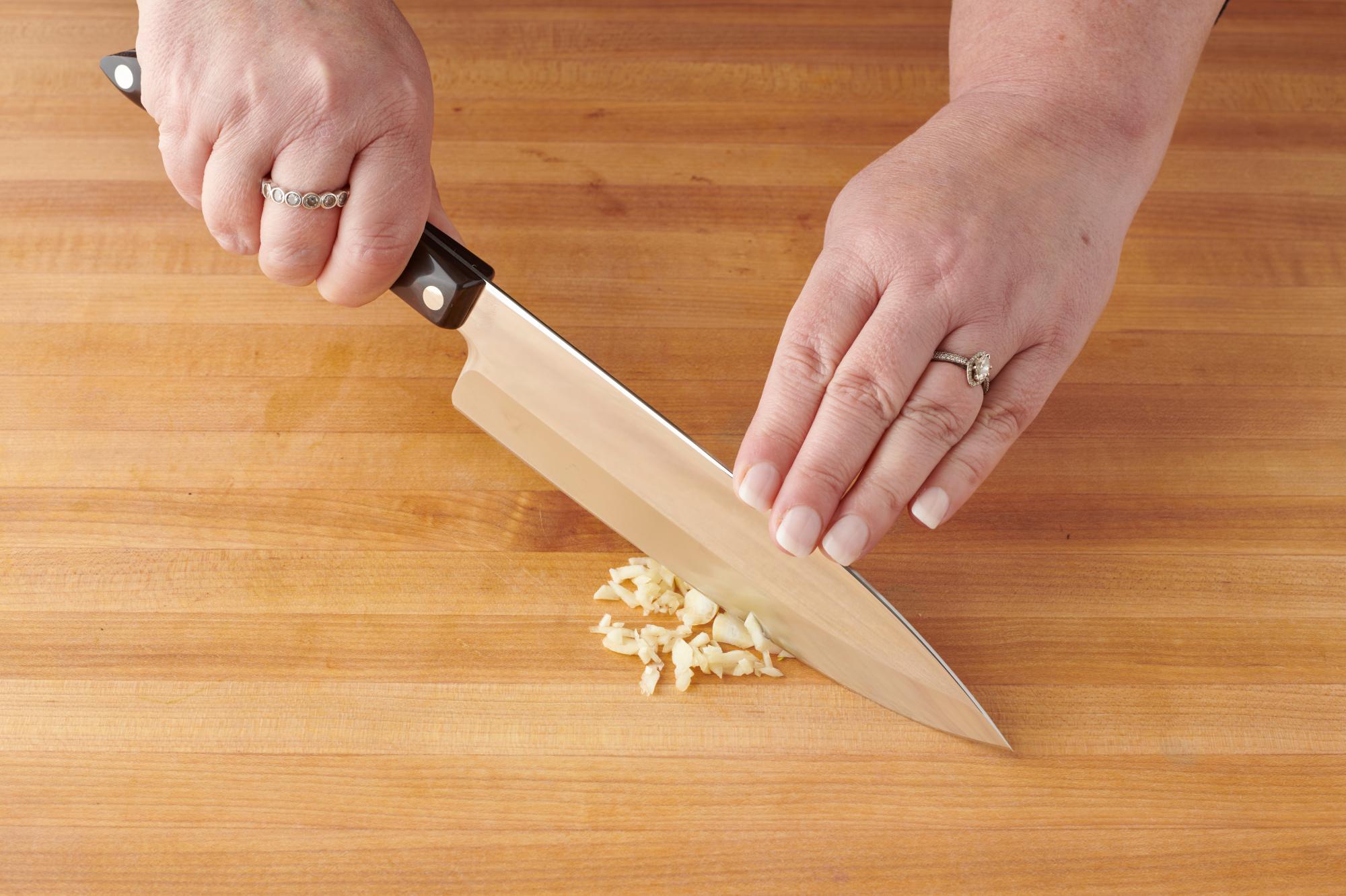 Mincing the garlic with a Petite Chef.