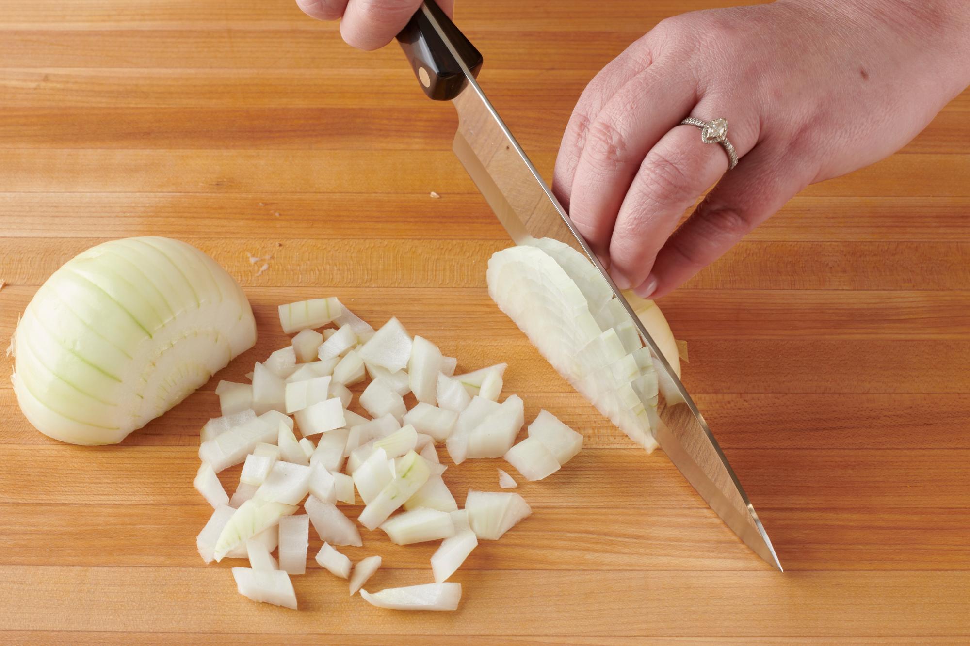 Chopping onion with a Petite Chef.