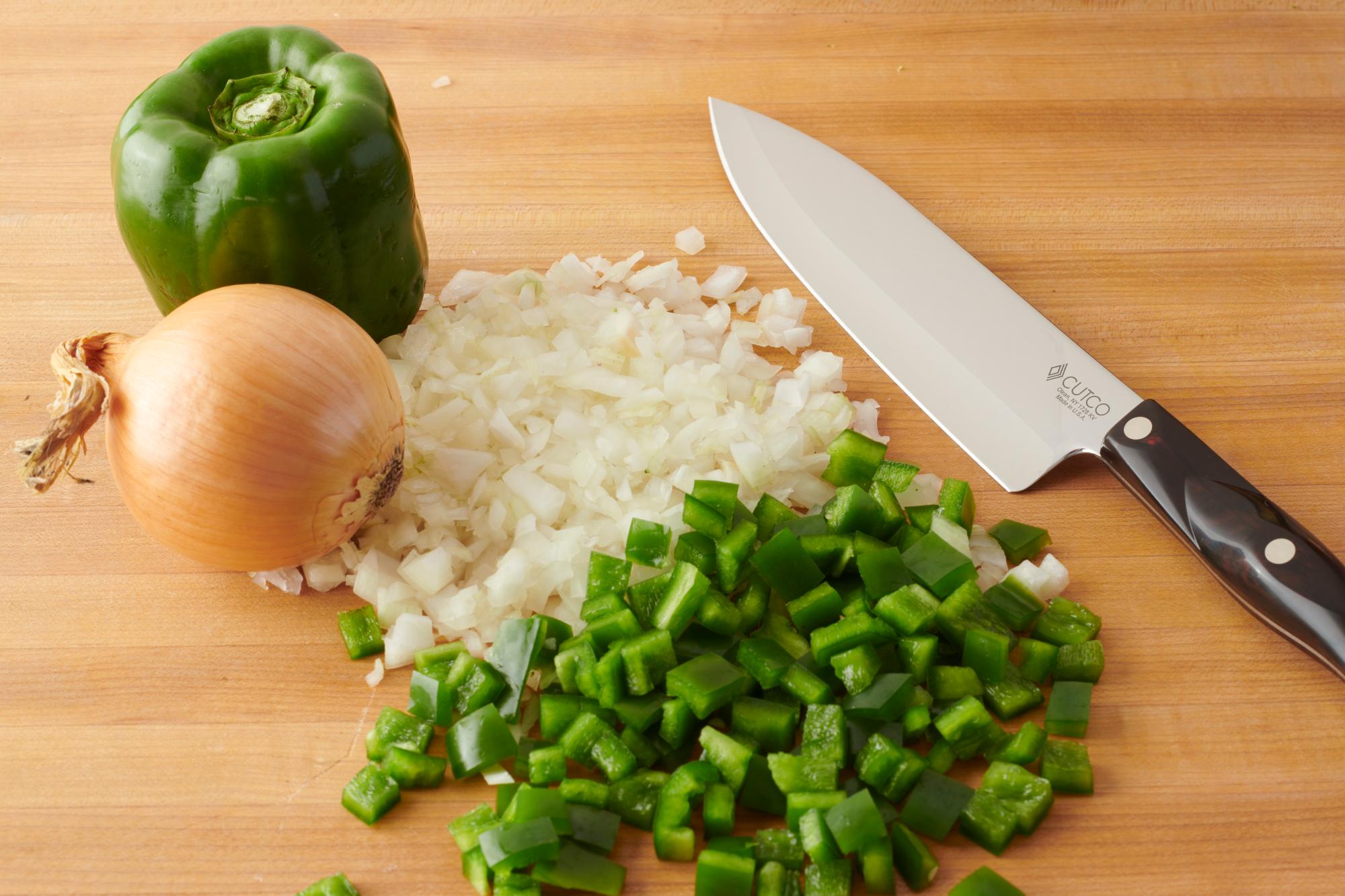 Using the Petite Chef to dice the onion and green pepper.