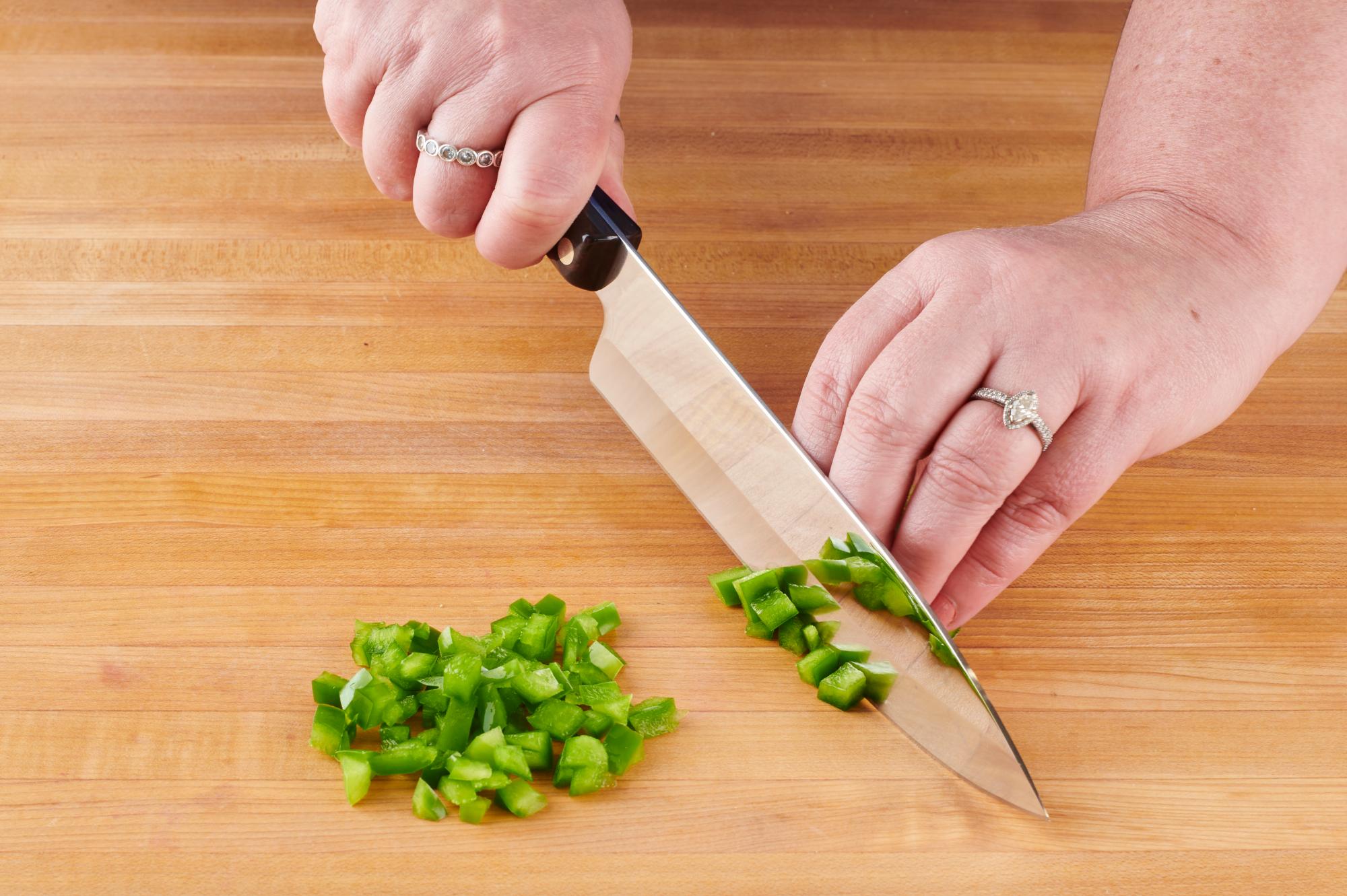 Dicing the green pepper with a Petite Chef.