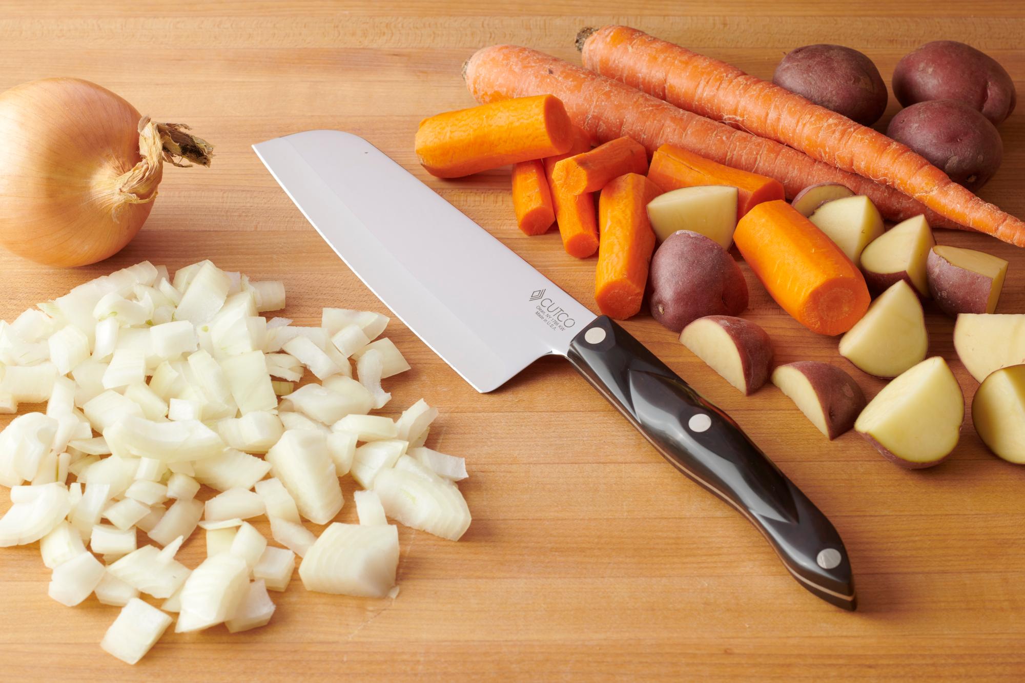 Santoku with prepped ingredients.