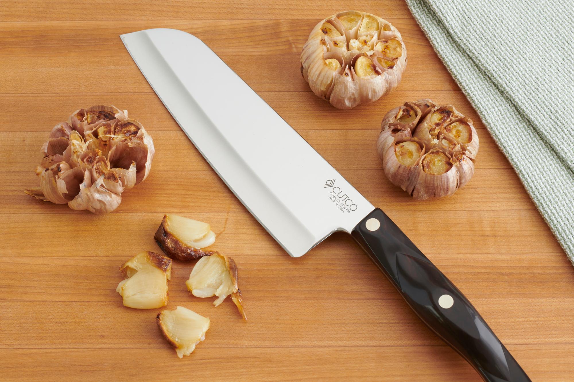 Smash the roasted garlic with a 7 Inch Santoku