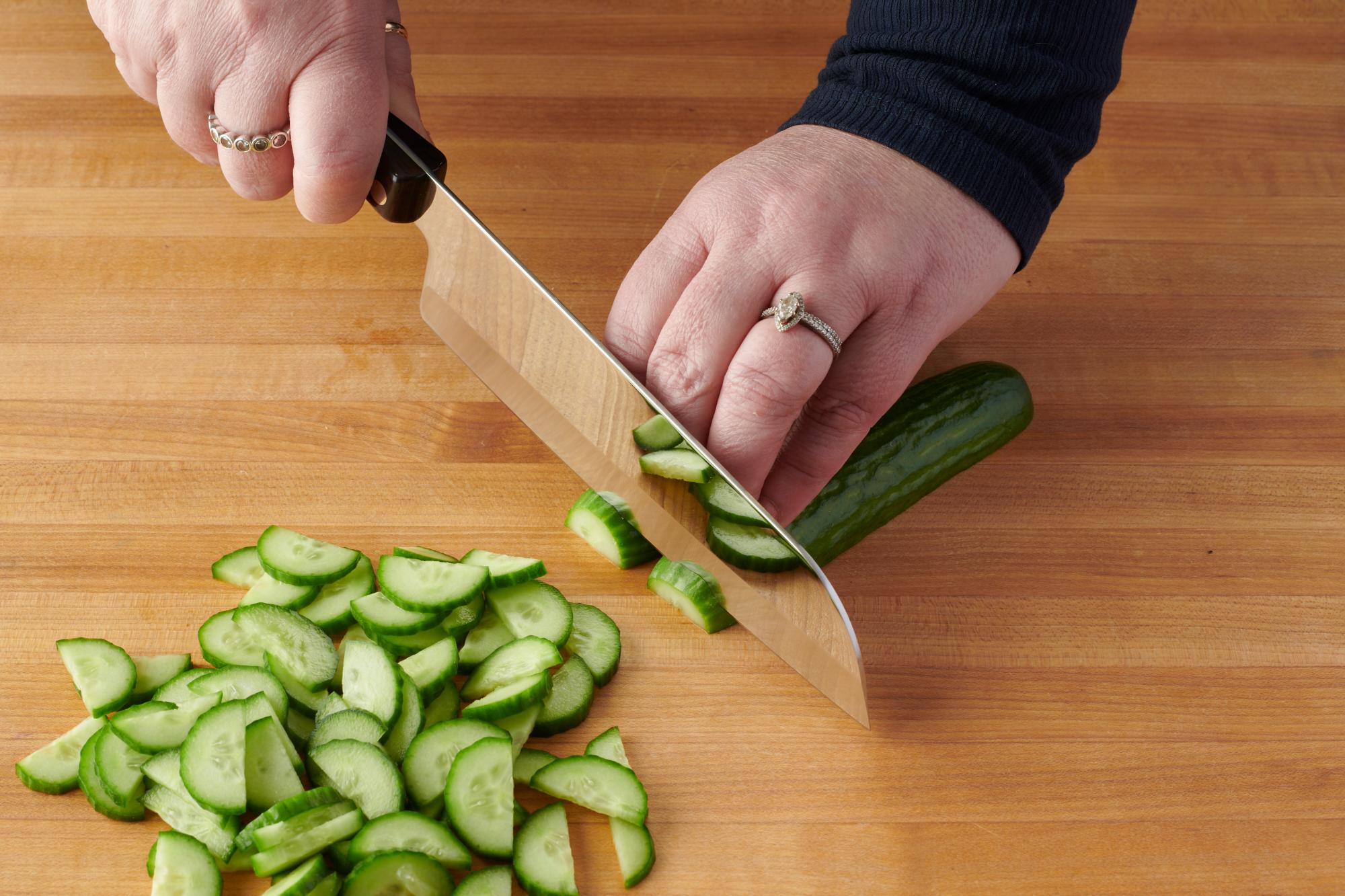 Slicing Cucumber with a Santoku.