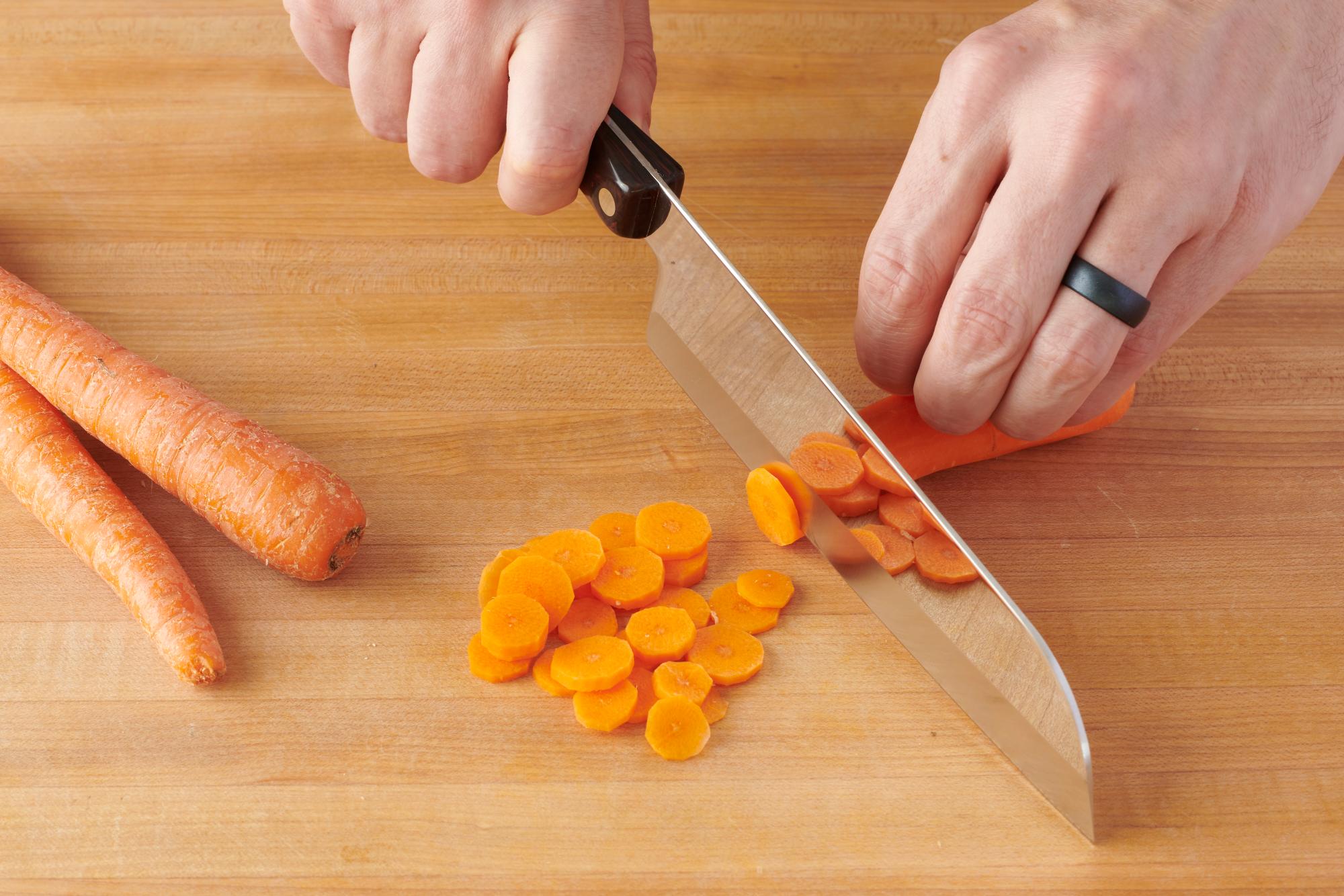 Slicing carrot with a Santoku.