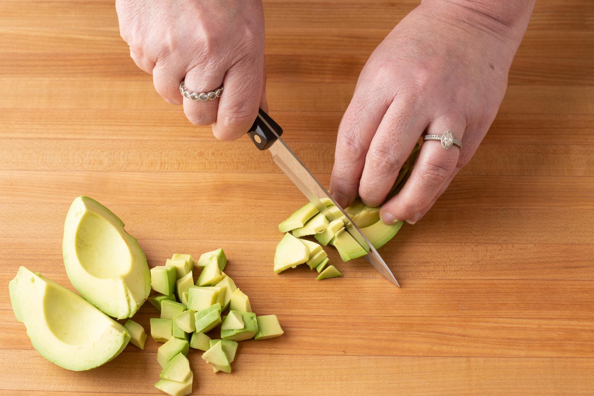 Cut the avocado into cubes with a 4 Inch Paring Knife.