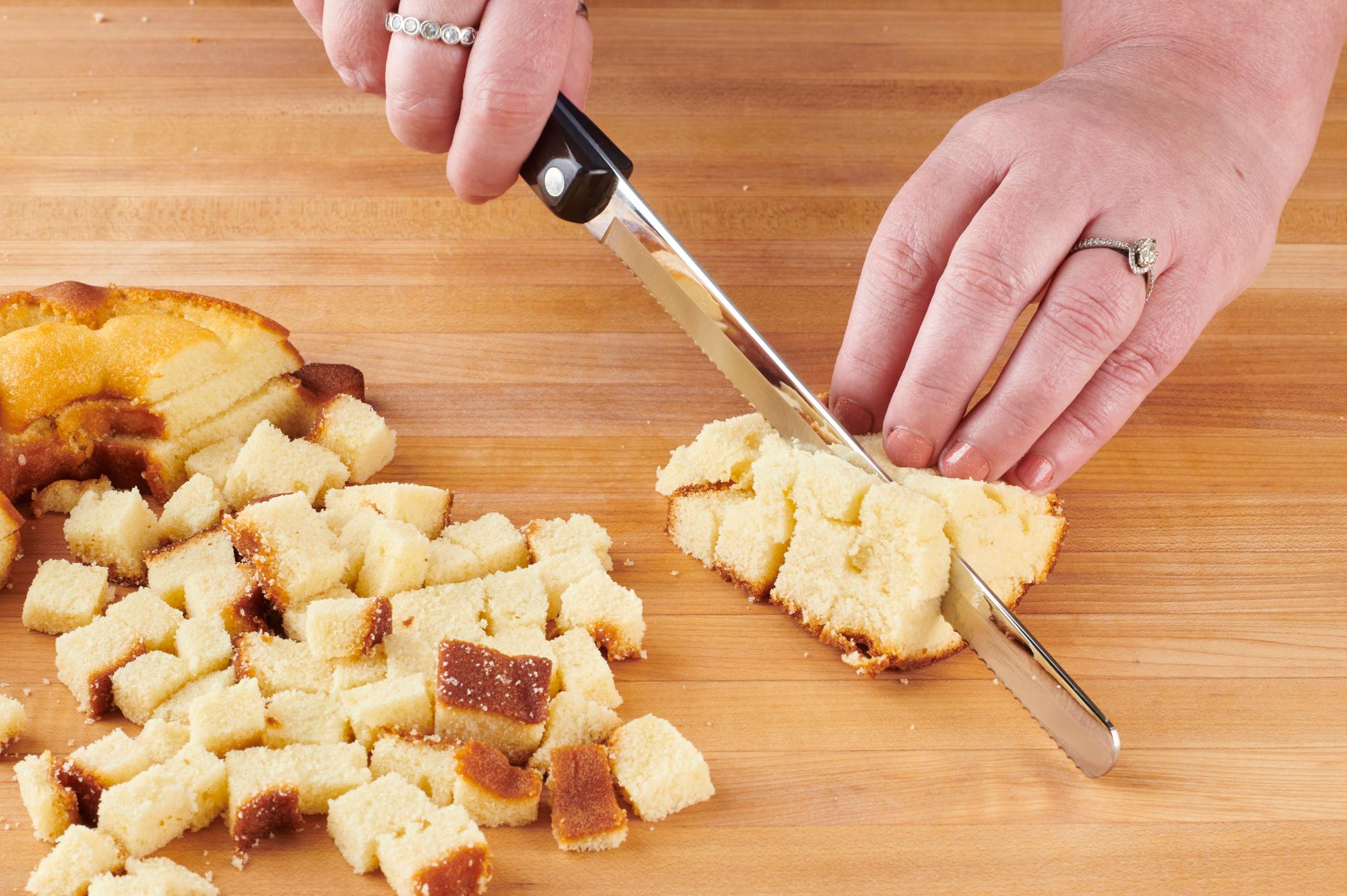 Cutting the pound cake into cubes with a Petite Slicer.