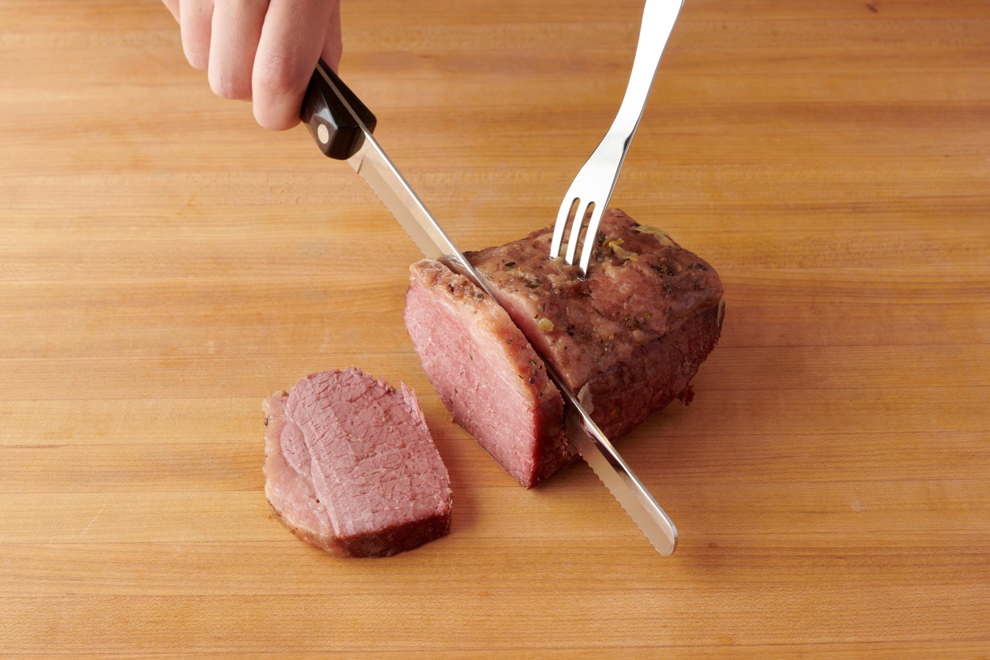 Slicing the meat with a Petite Slicer.