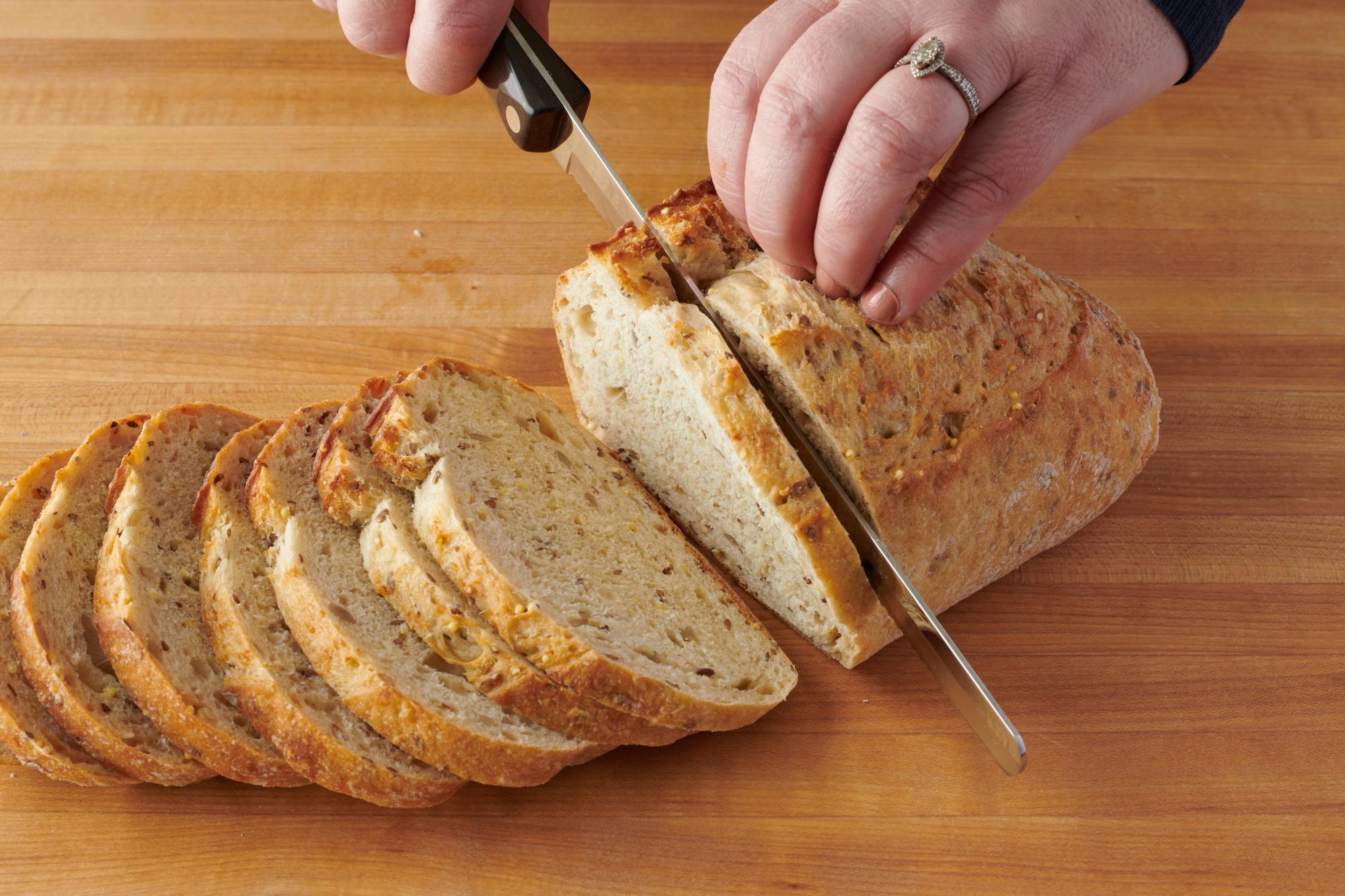 Slicing the bread with a Petite Slicer.