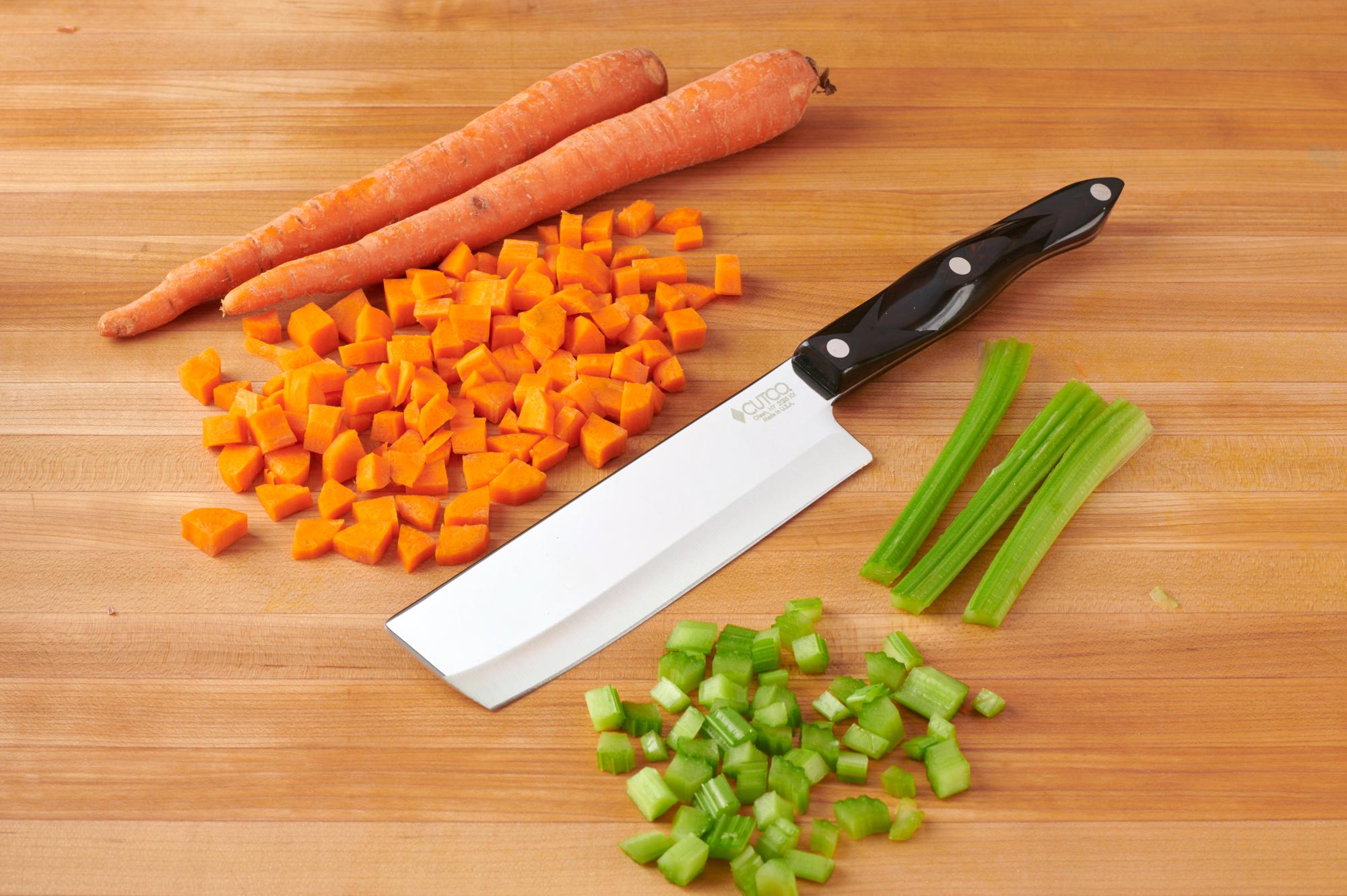 Dice the carrots and celery with a 6 Inch Vegetable Knife.