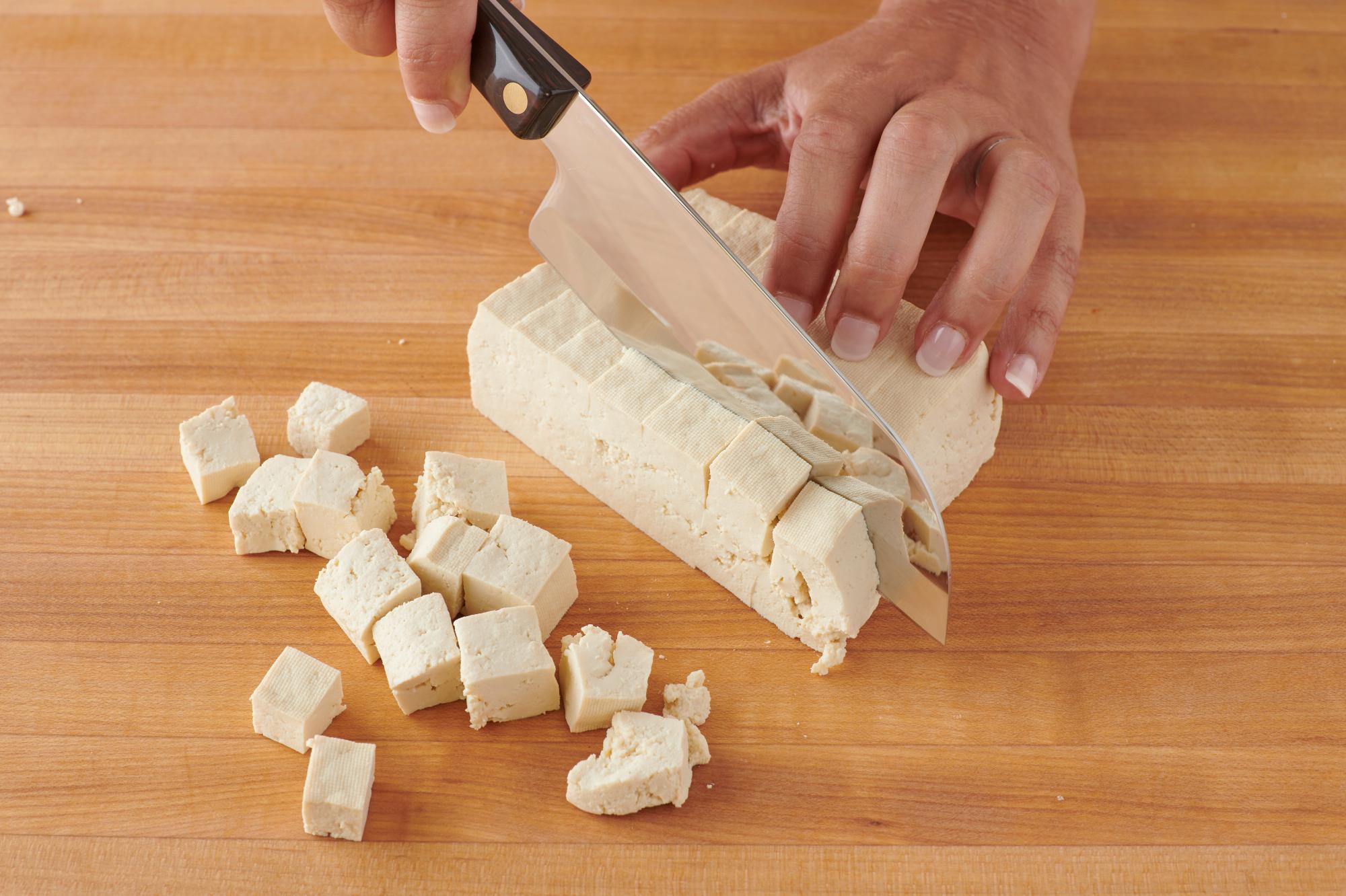 Cutting the tofu with a Petite Santoku.