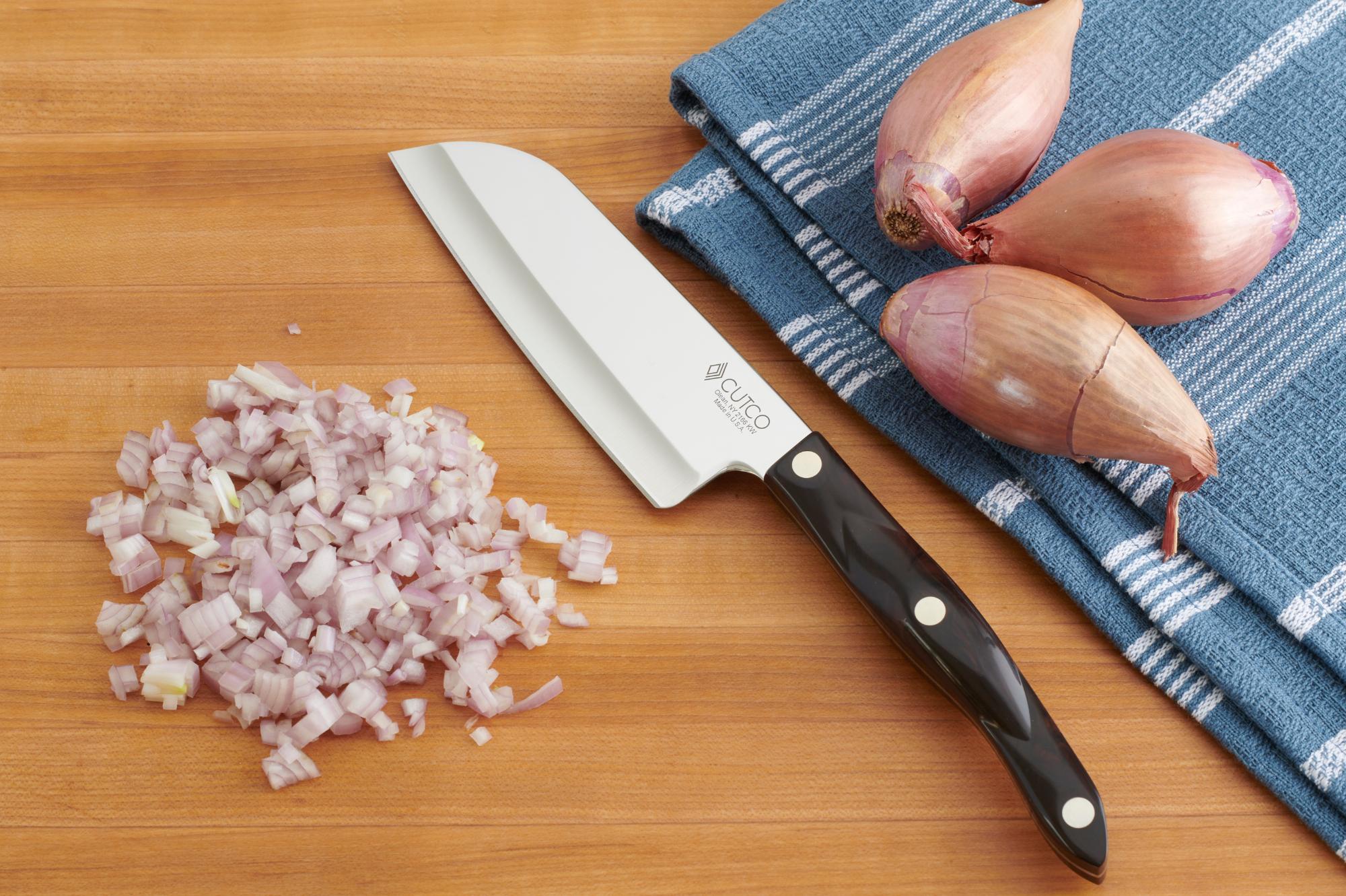 Using a Petite Santoku to cut the shallots.