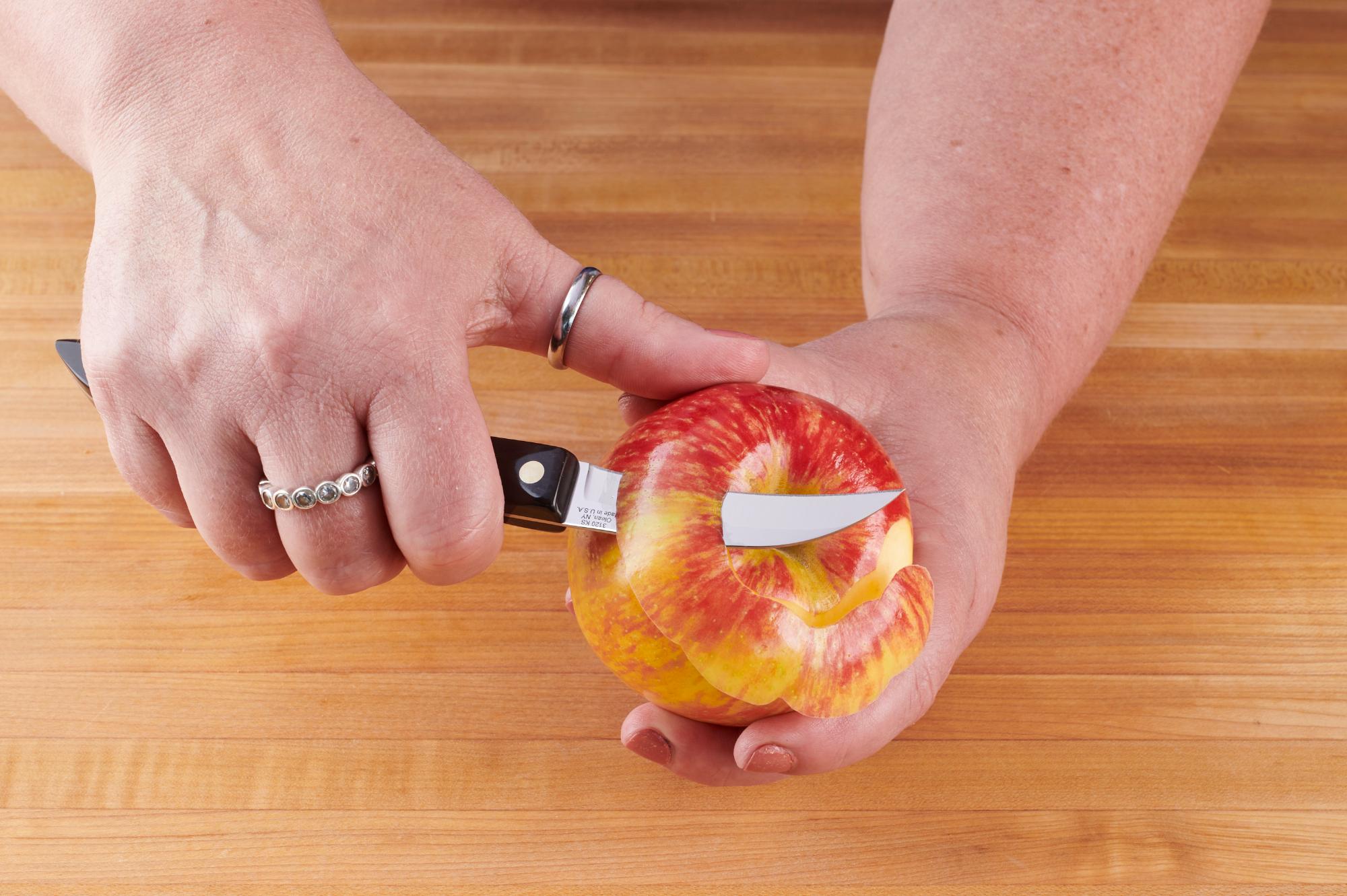 Peel the apples with a Bird's Peak Paring Knife.
