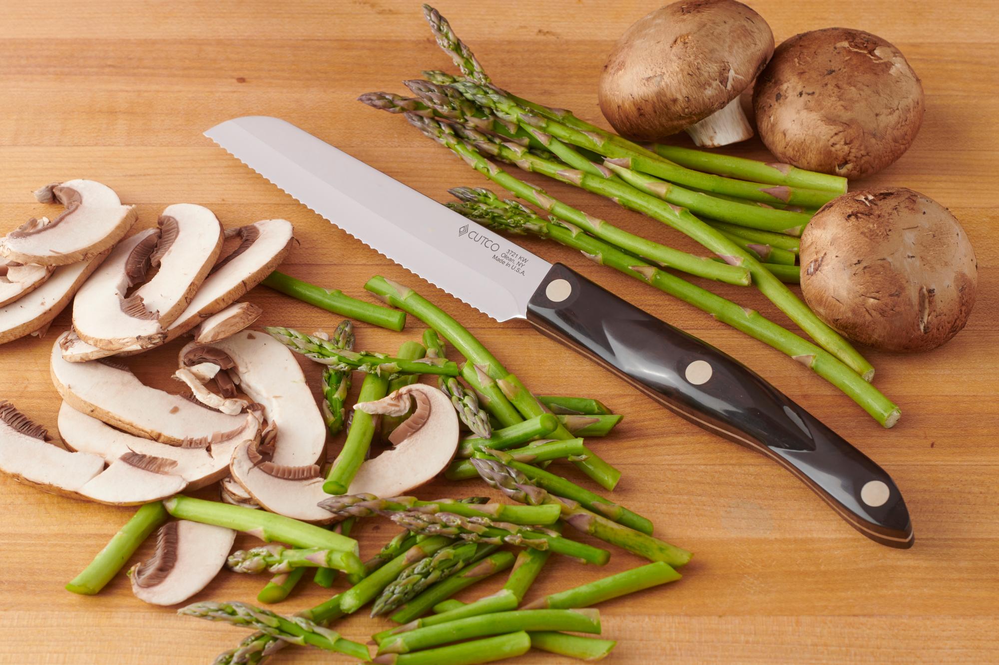 A Santoku-Style Trimmer with the mushrooms and asparagus.