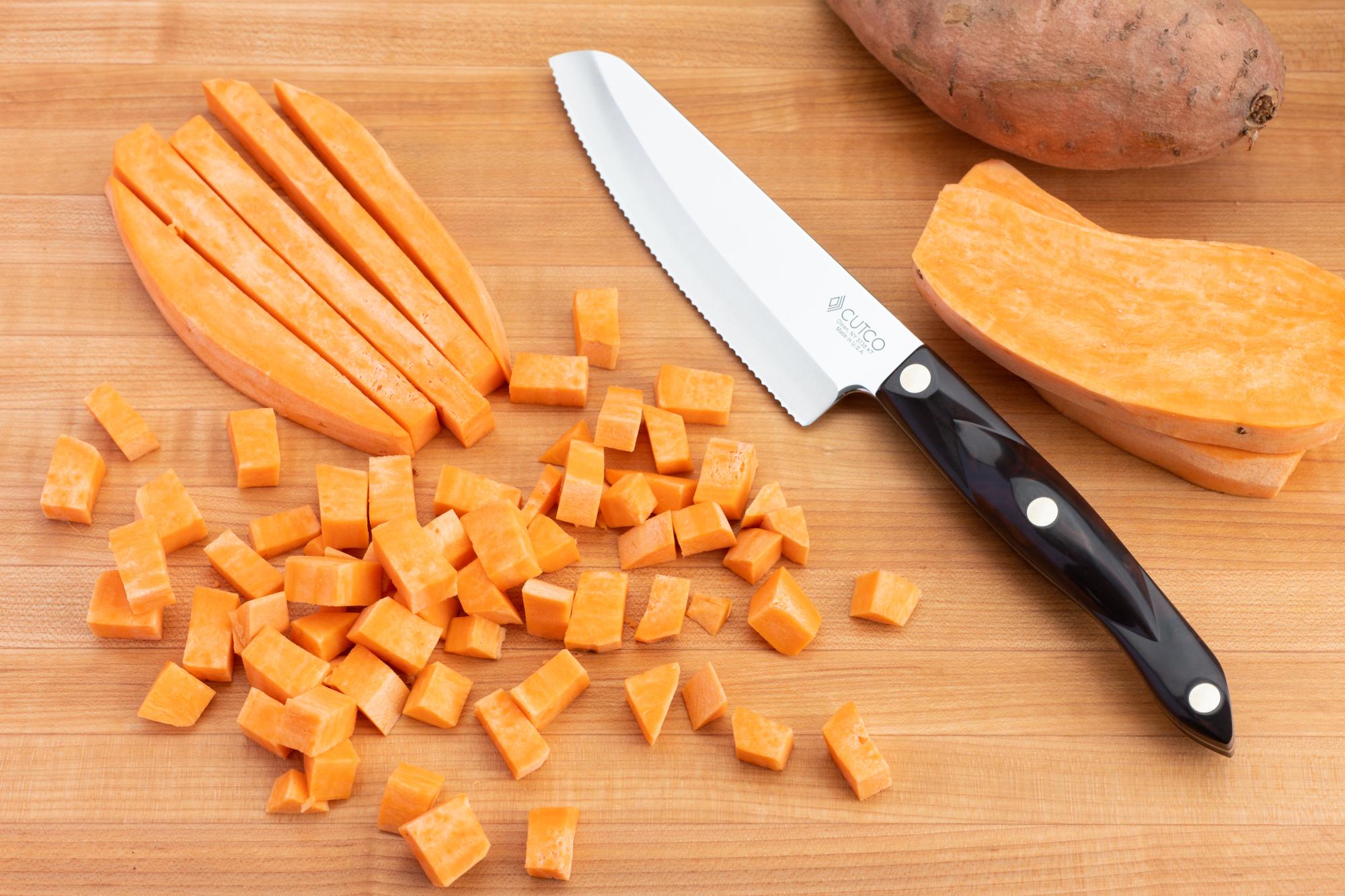 Cutting the sweet potatoes with a Hardy Slicer.