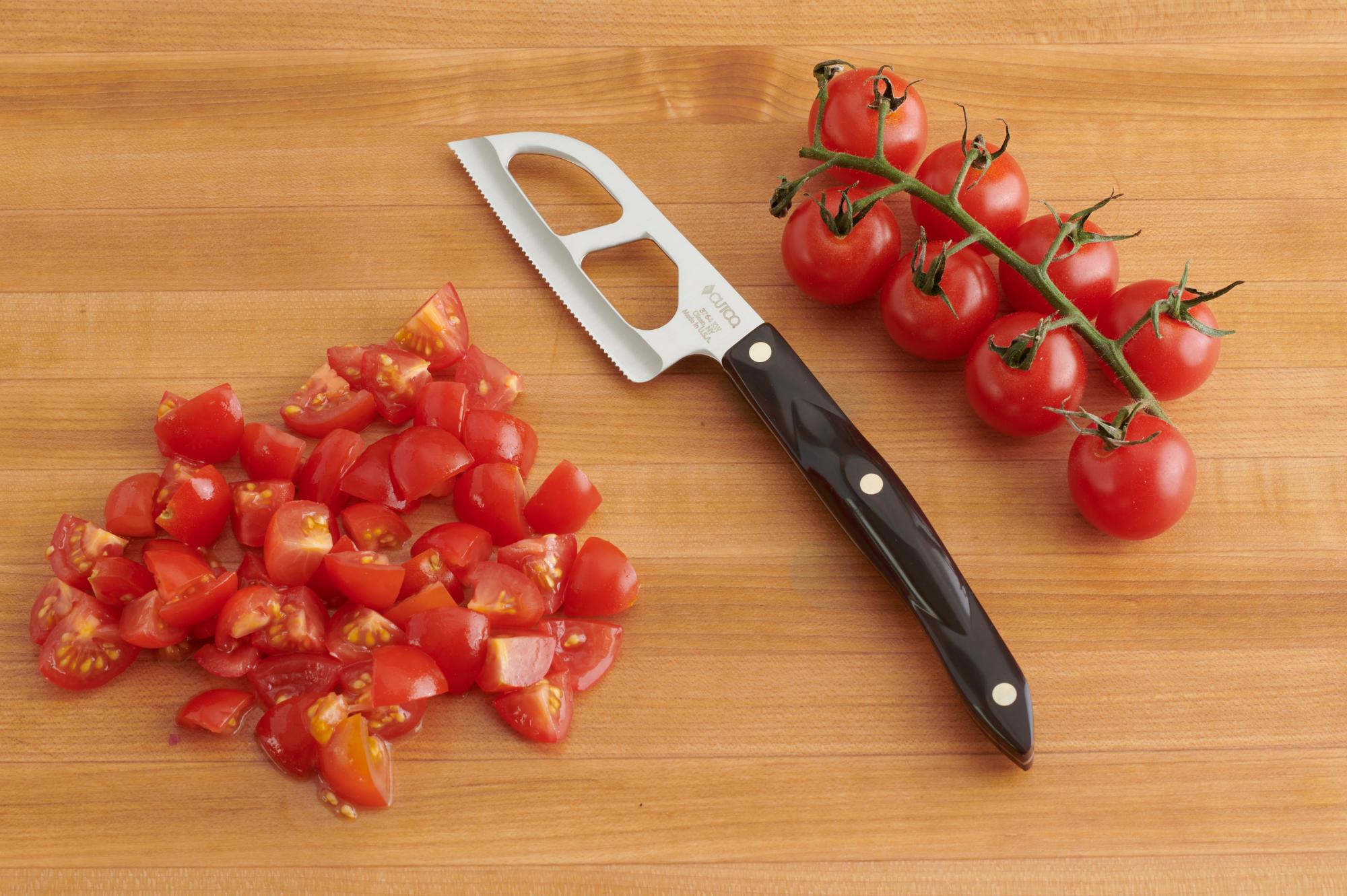 Cut the tomatoes with a Santoku-Style Cheese Knife.