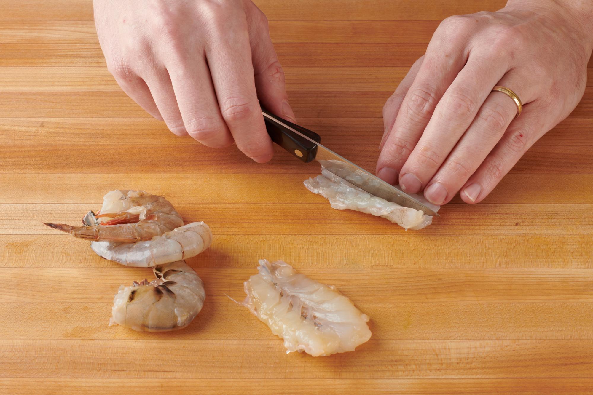 Butterflying shrimp with a 3 Inch Gourmet Paring Knife.