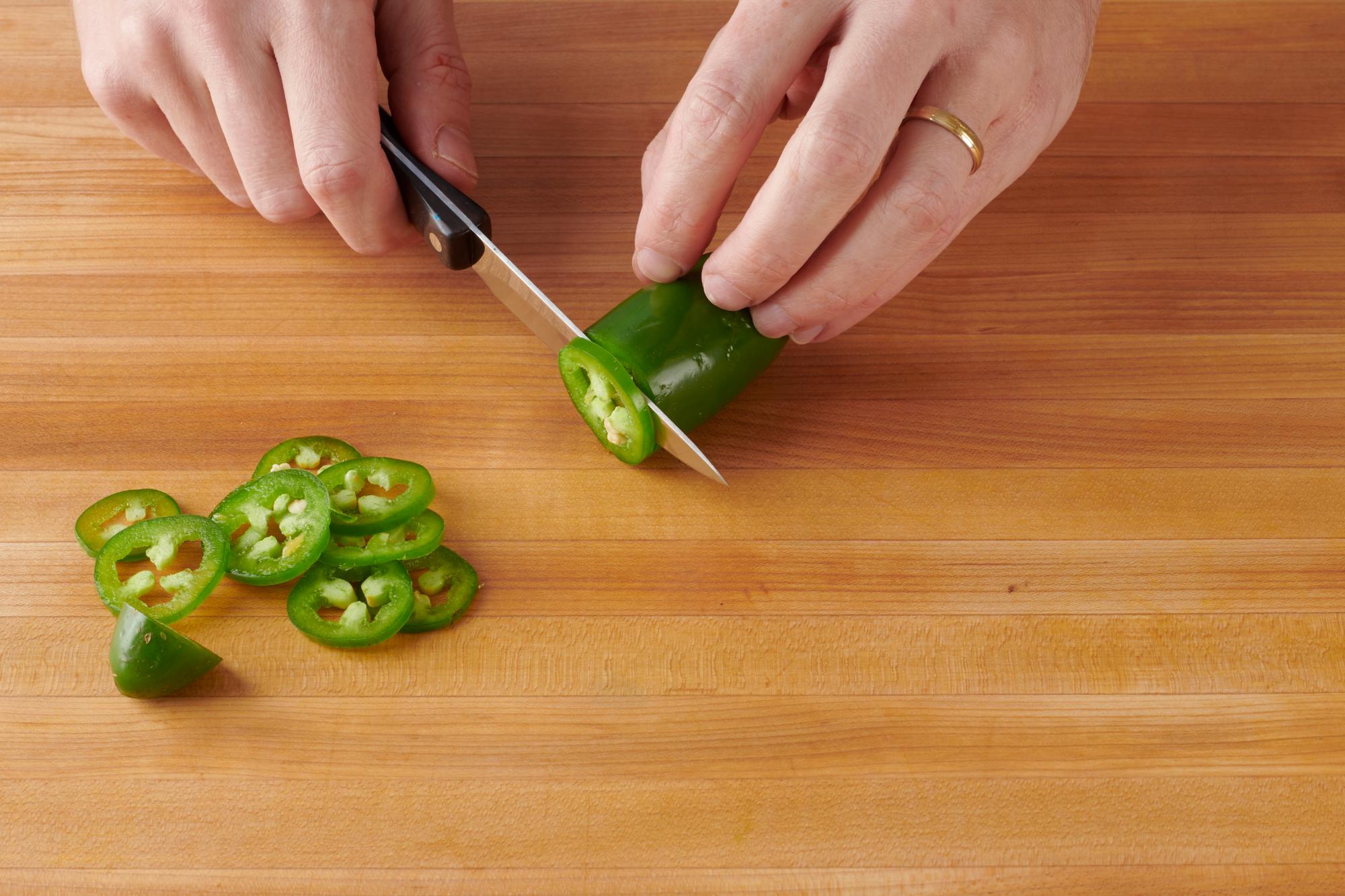 Slicing jalapeno with a 4 Inch Gourmet Paring Knife.