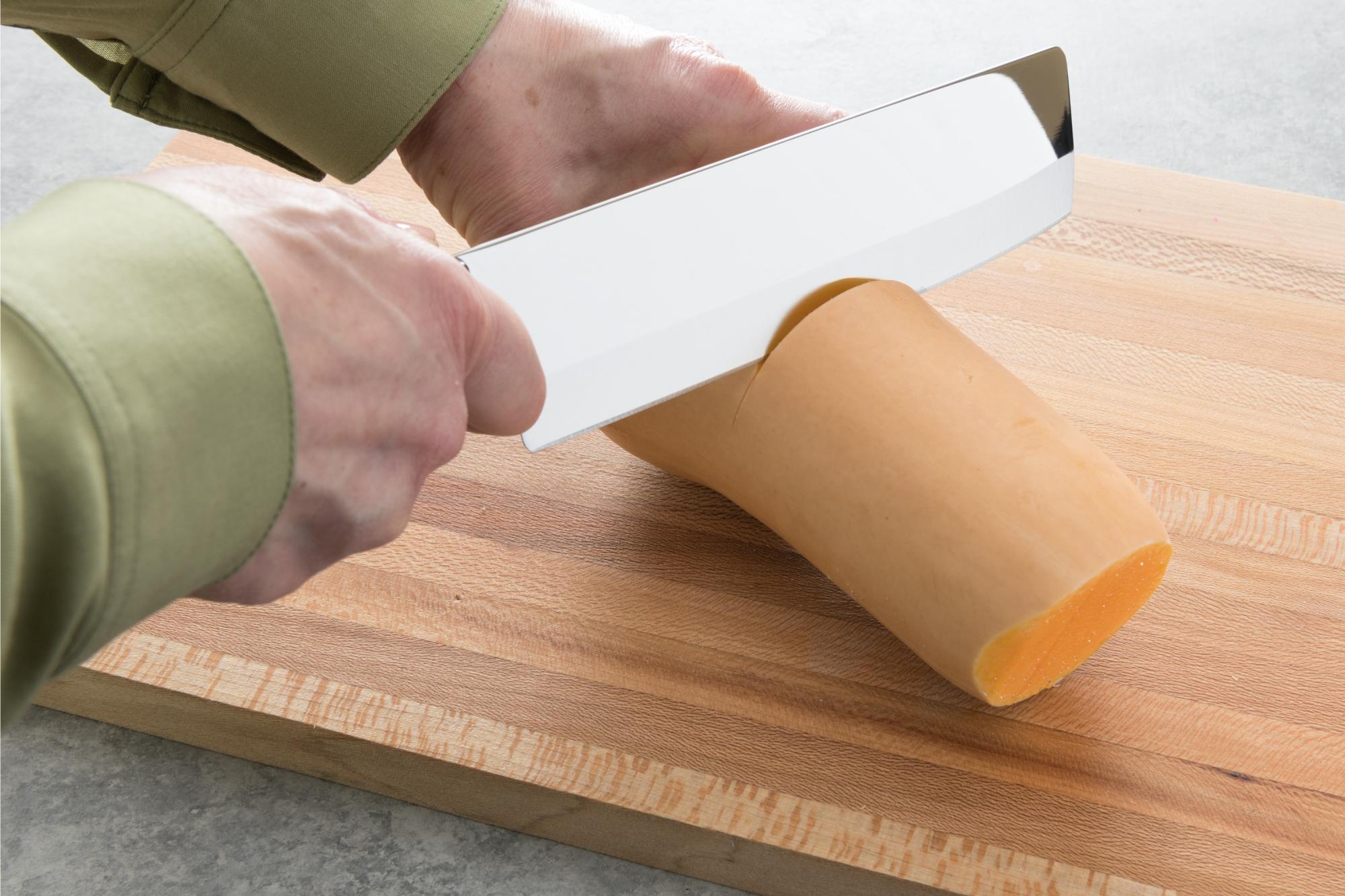 Cutting the squash with a Vegetable Knife.