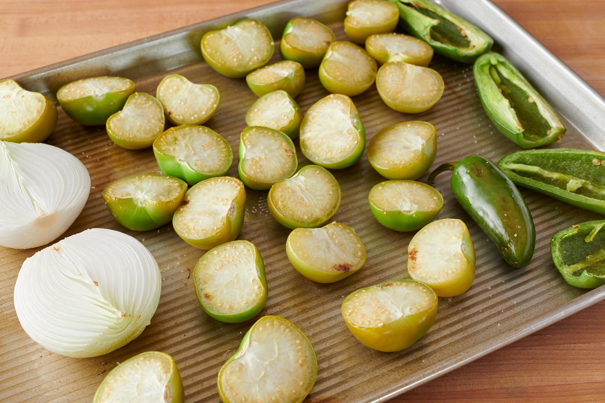 Roasting the tomatillos, onion and jalapenos.
