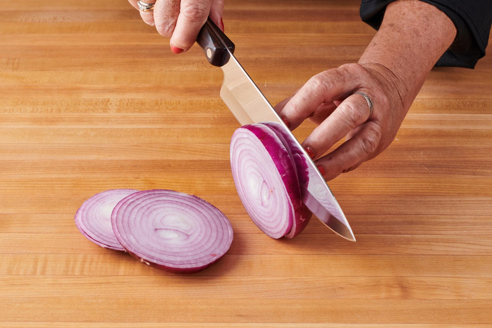 slicing the onion with P Chef