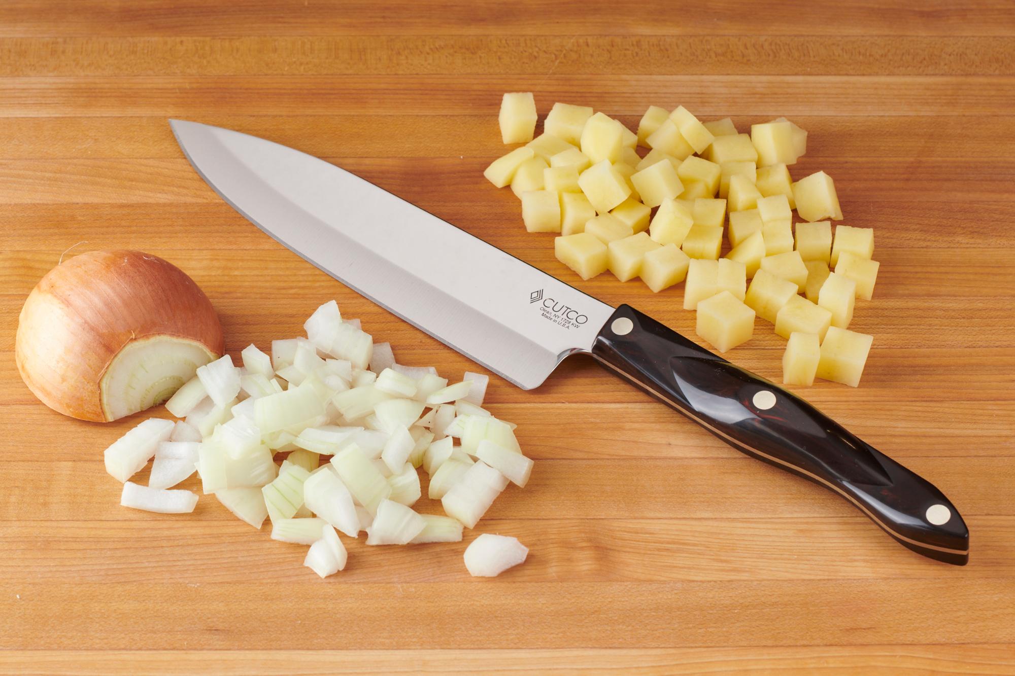 Diced potatoes and onions with a Petite Chef.