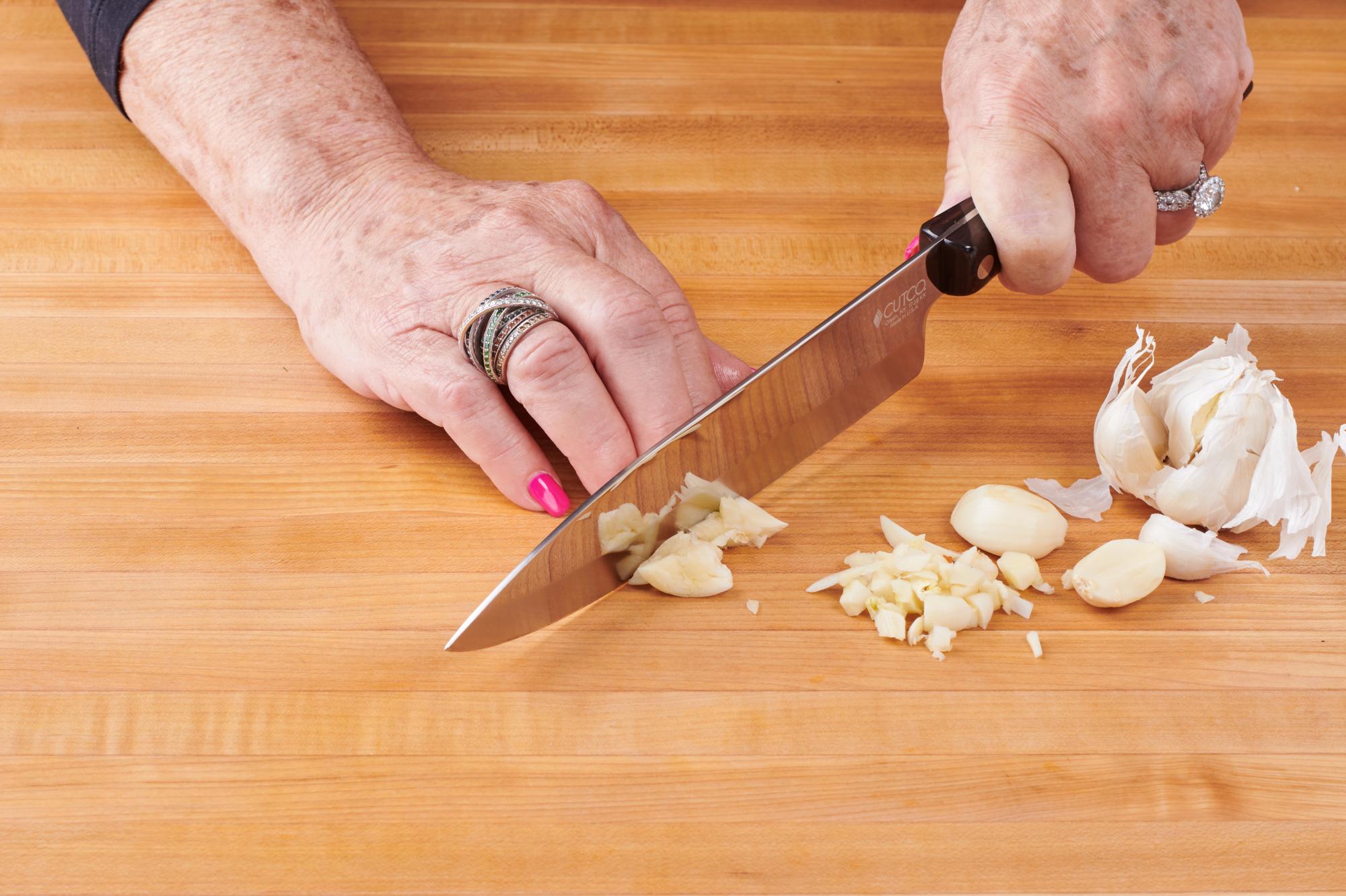 Chopping garlic with a Petite Chef.