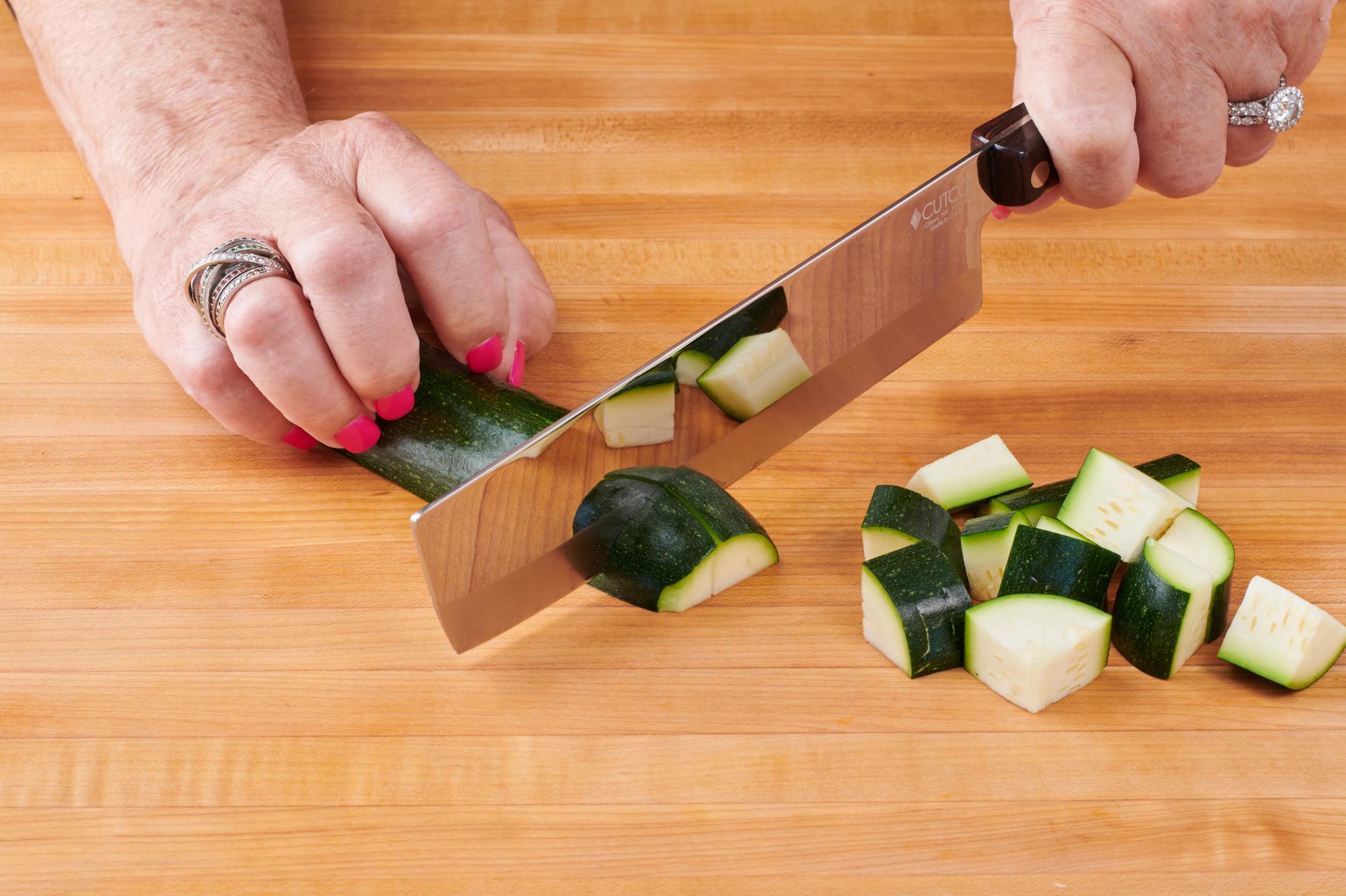 Vegetable Knife slicing zucchini