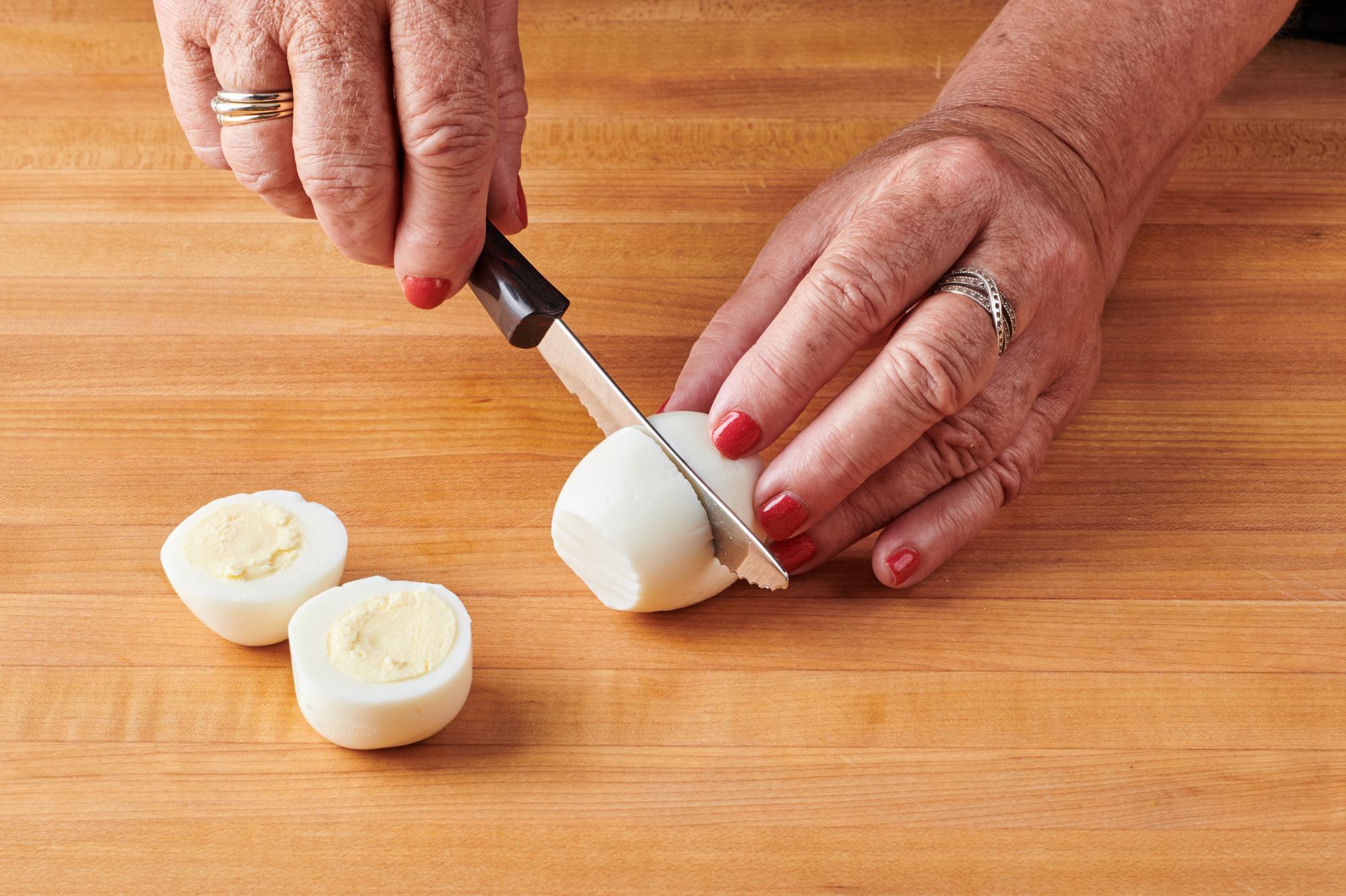 Cutting boiled eggs in half with Table Knife