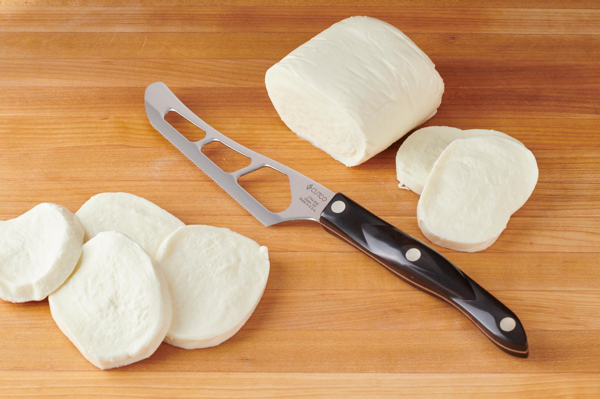 Slicing mozzarella with a Traditional Cheese Knife.