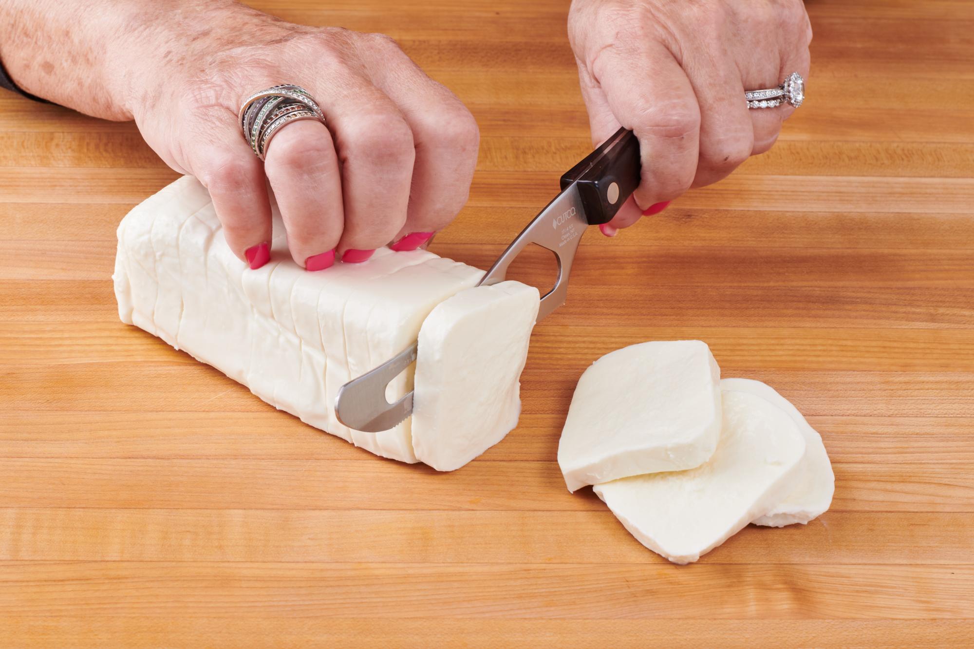 slicing mozzarella with Cheese Knife