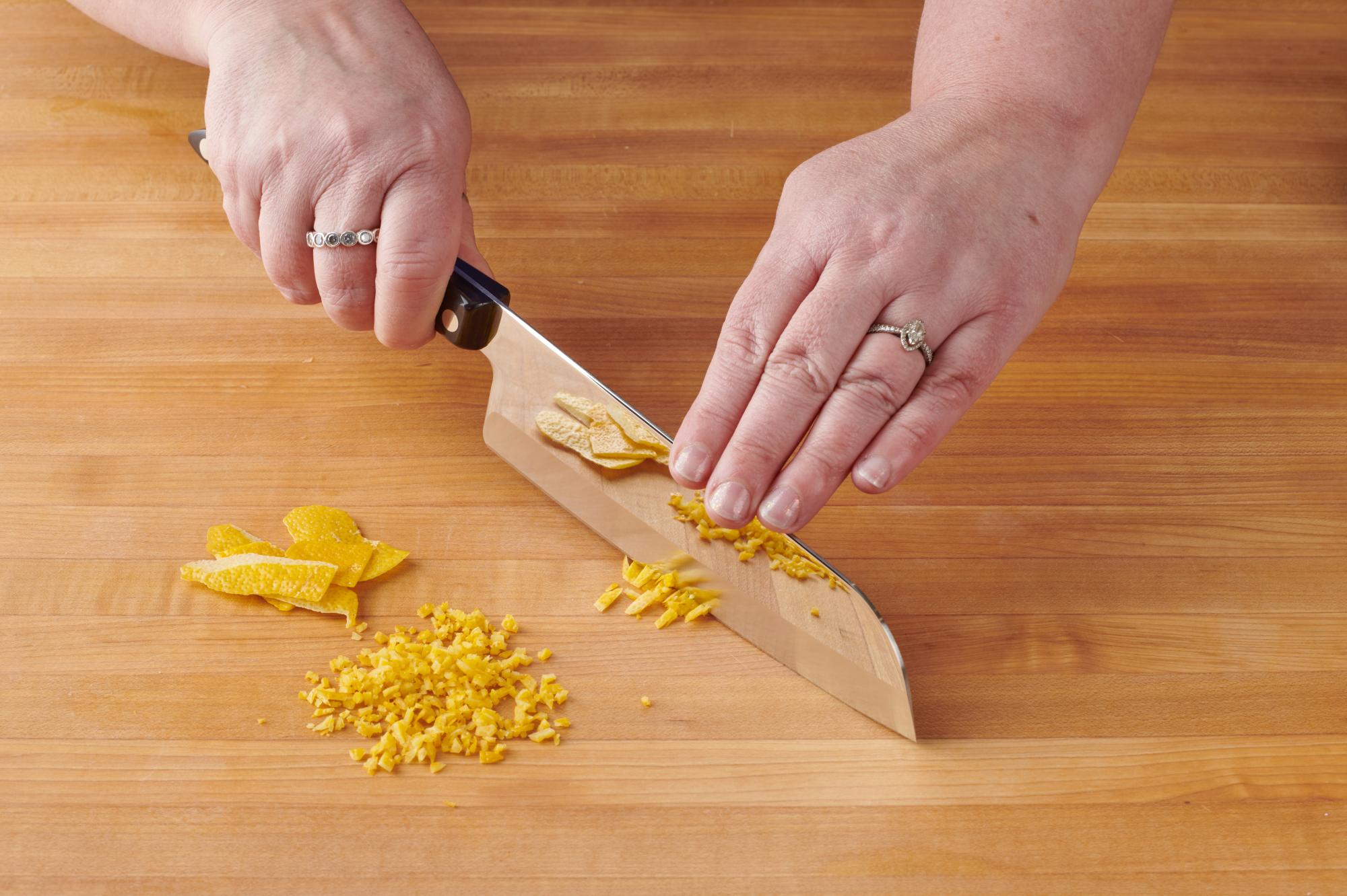 Making lemon zest with a Santoku.