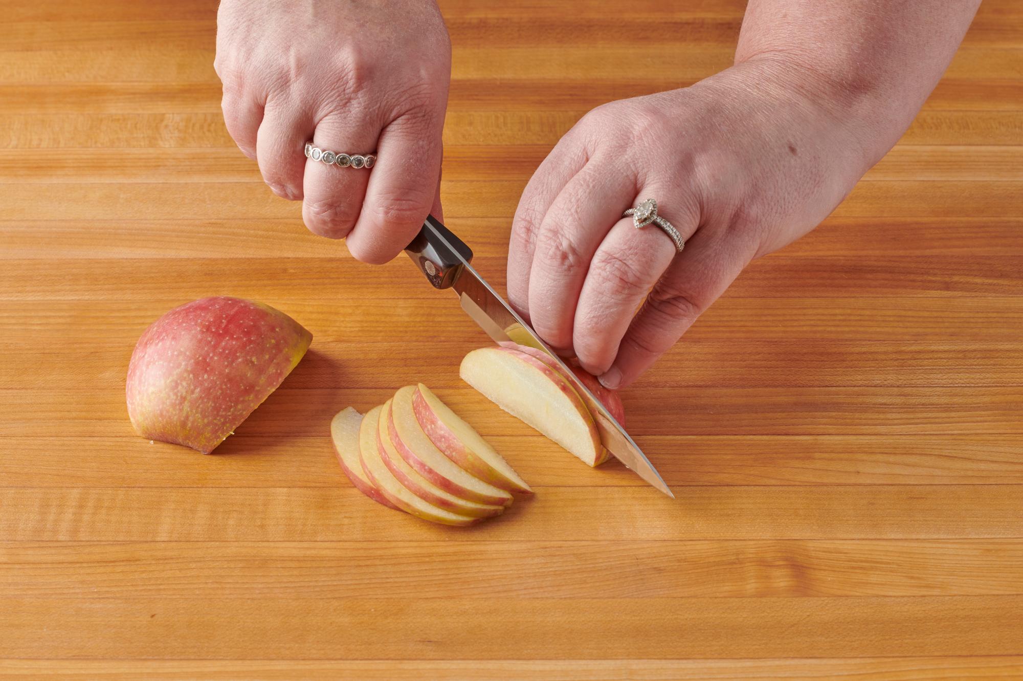 Slicing apples with a 4 Inch Paring Knife.