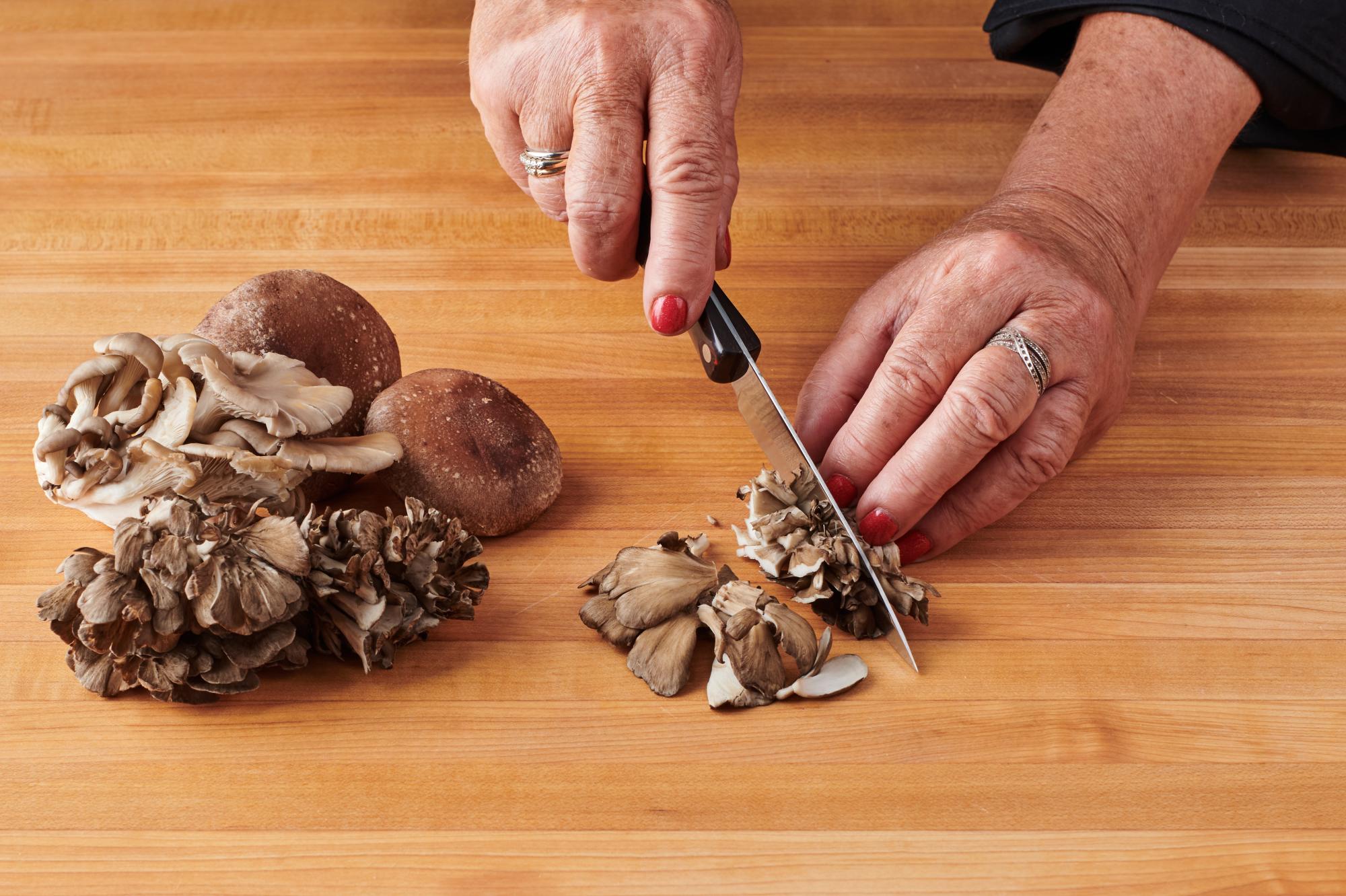 Cutting mushrooms with a 4 Inch Paring Knife.