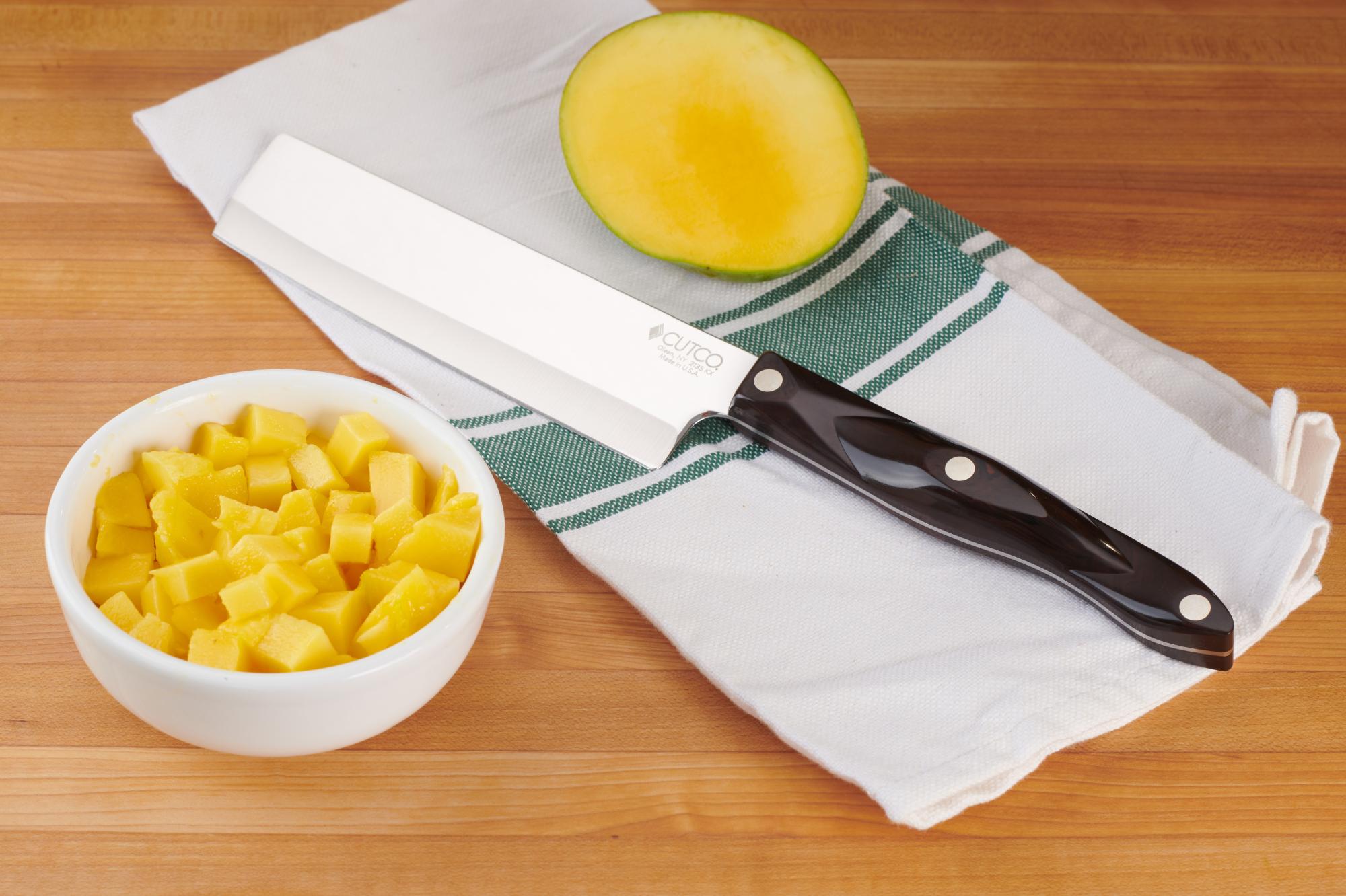 Cutting the mango with a 6 Inch Vegetable Knife.