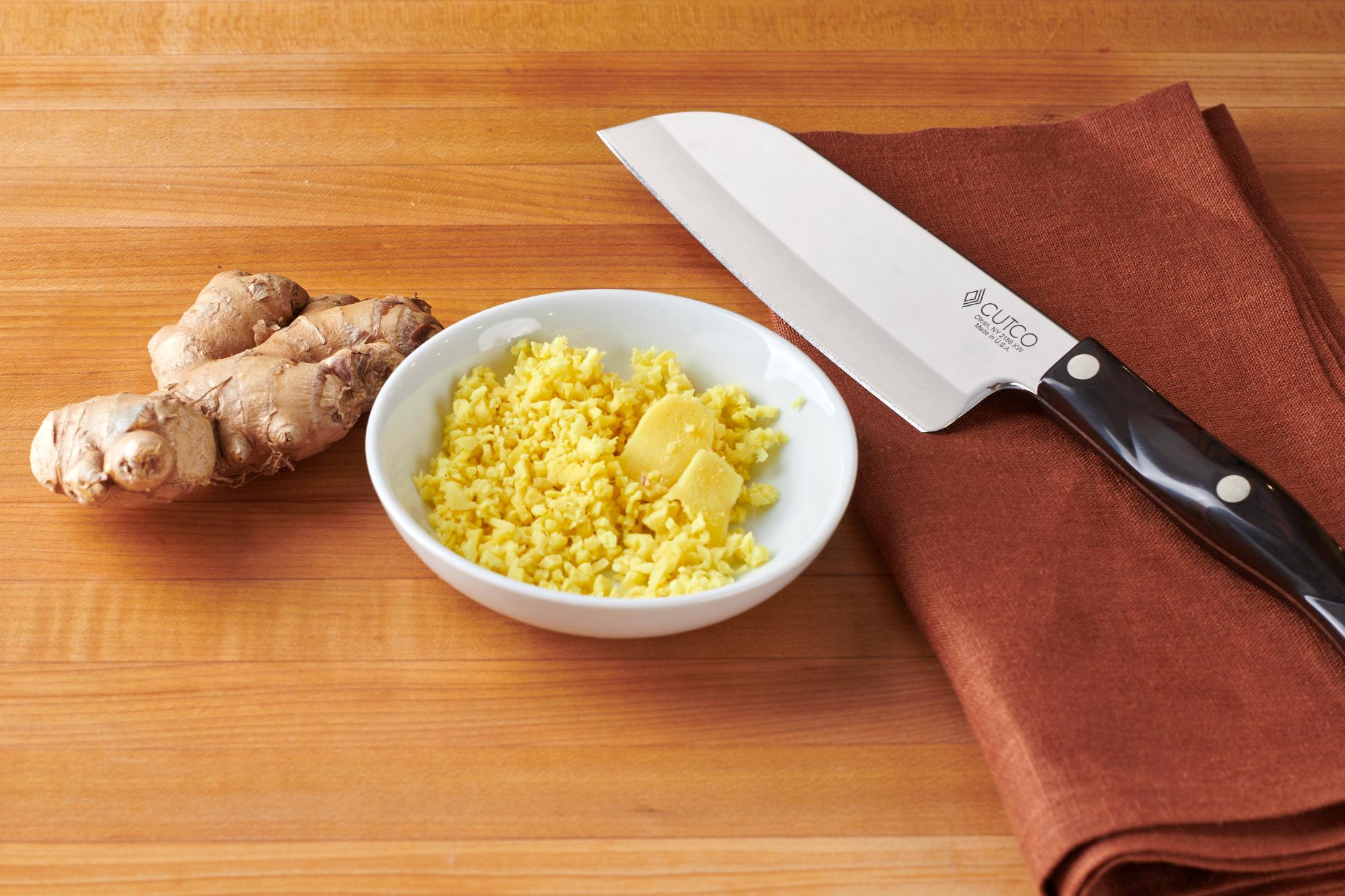 Minced ginger with a Petite Santoku.