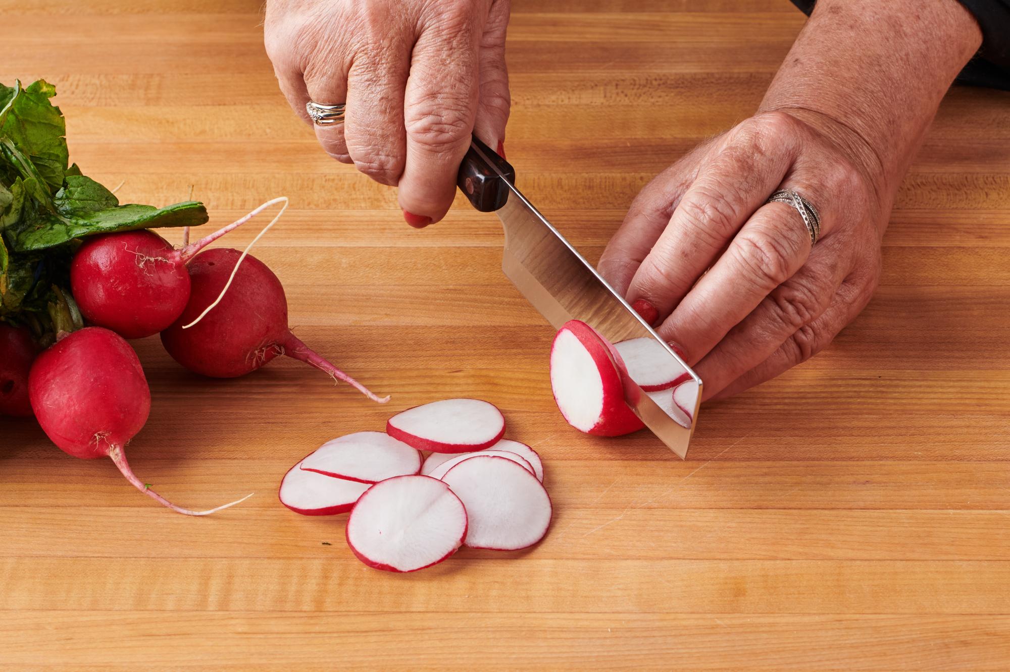 slicing radishes with 4″ Vegetable Knife