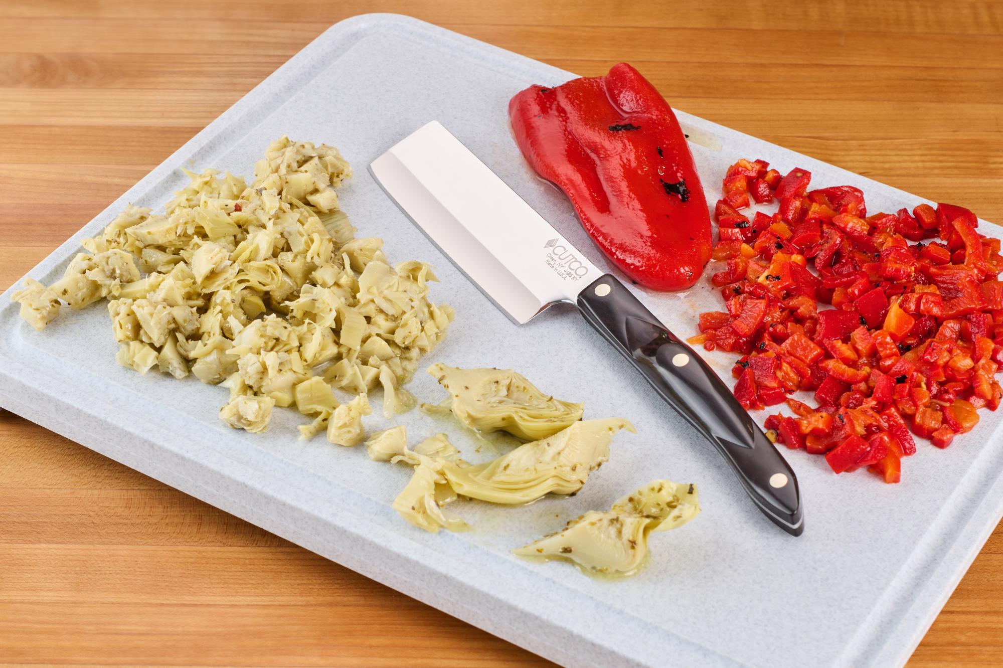 Chopped roasted red pepper and artichoke hearts with 4” Vegetable Knife