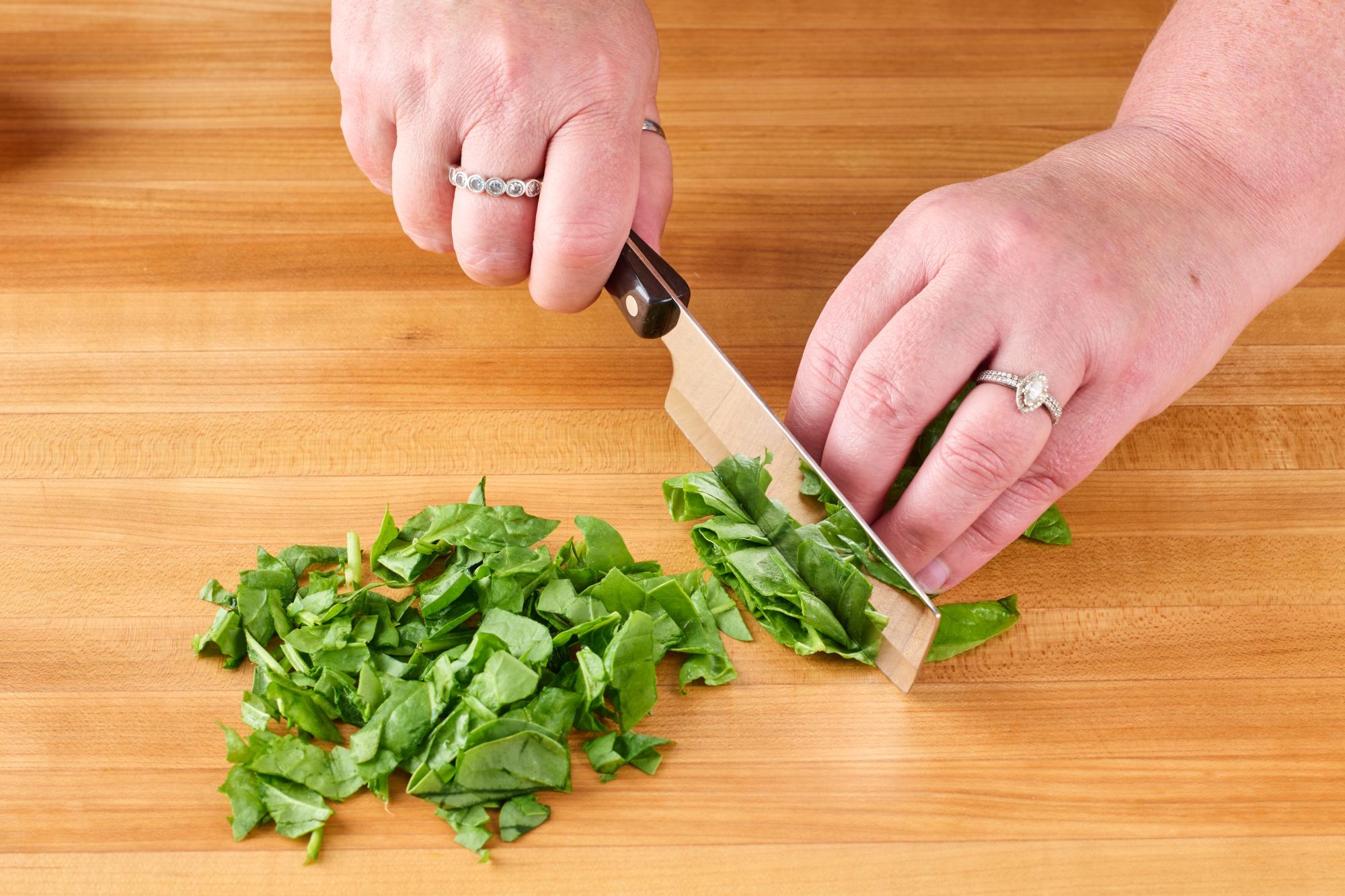 Chopping baby spinach with 4” Vegetable Knife