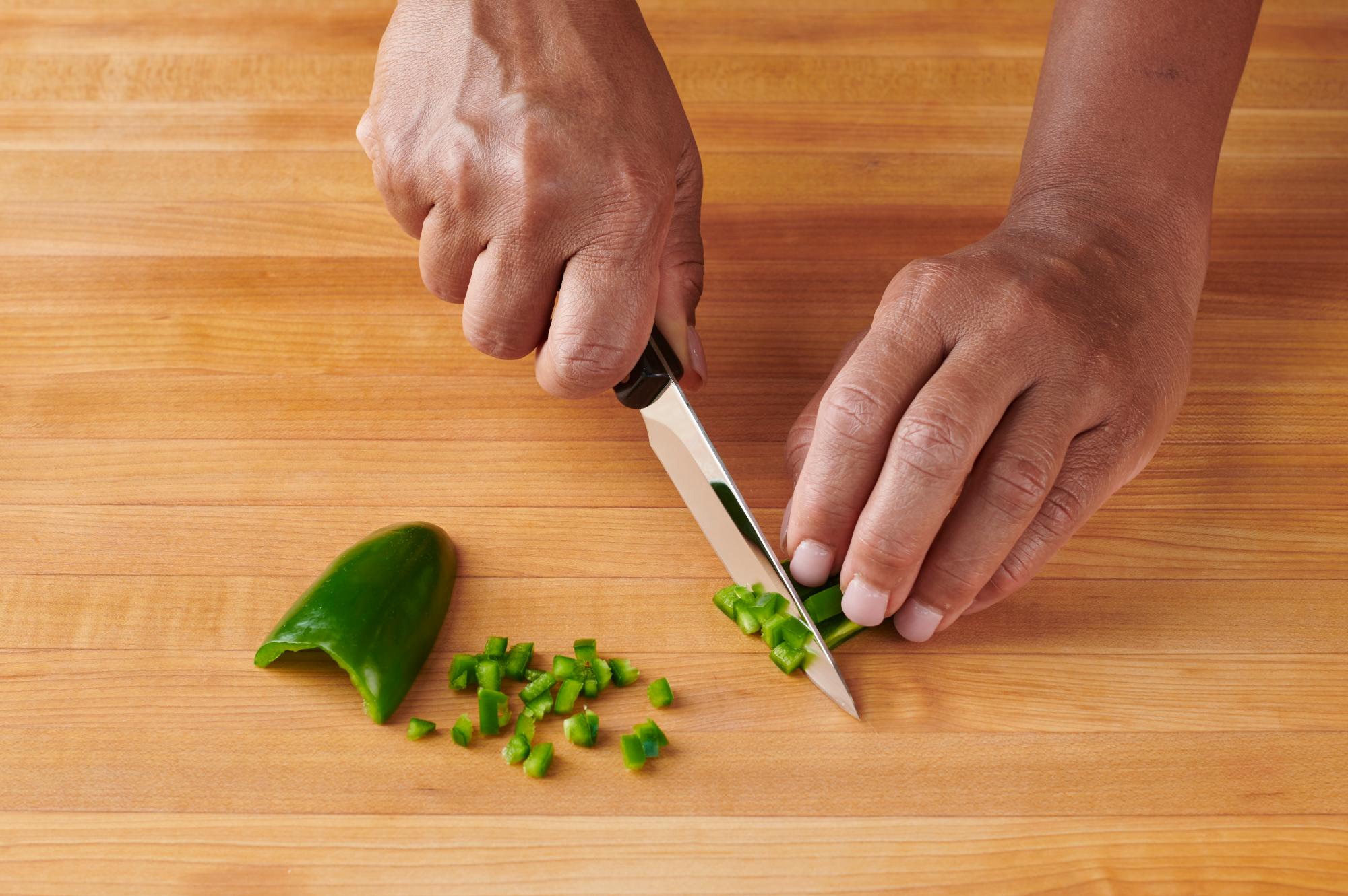 Mincing a jalapeno with a 4 Inch Gourmet Paring Knife.