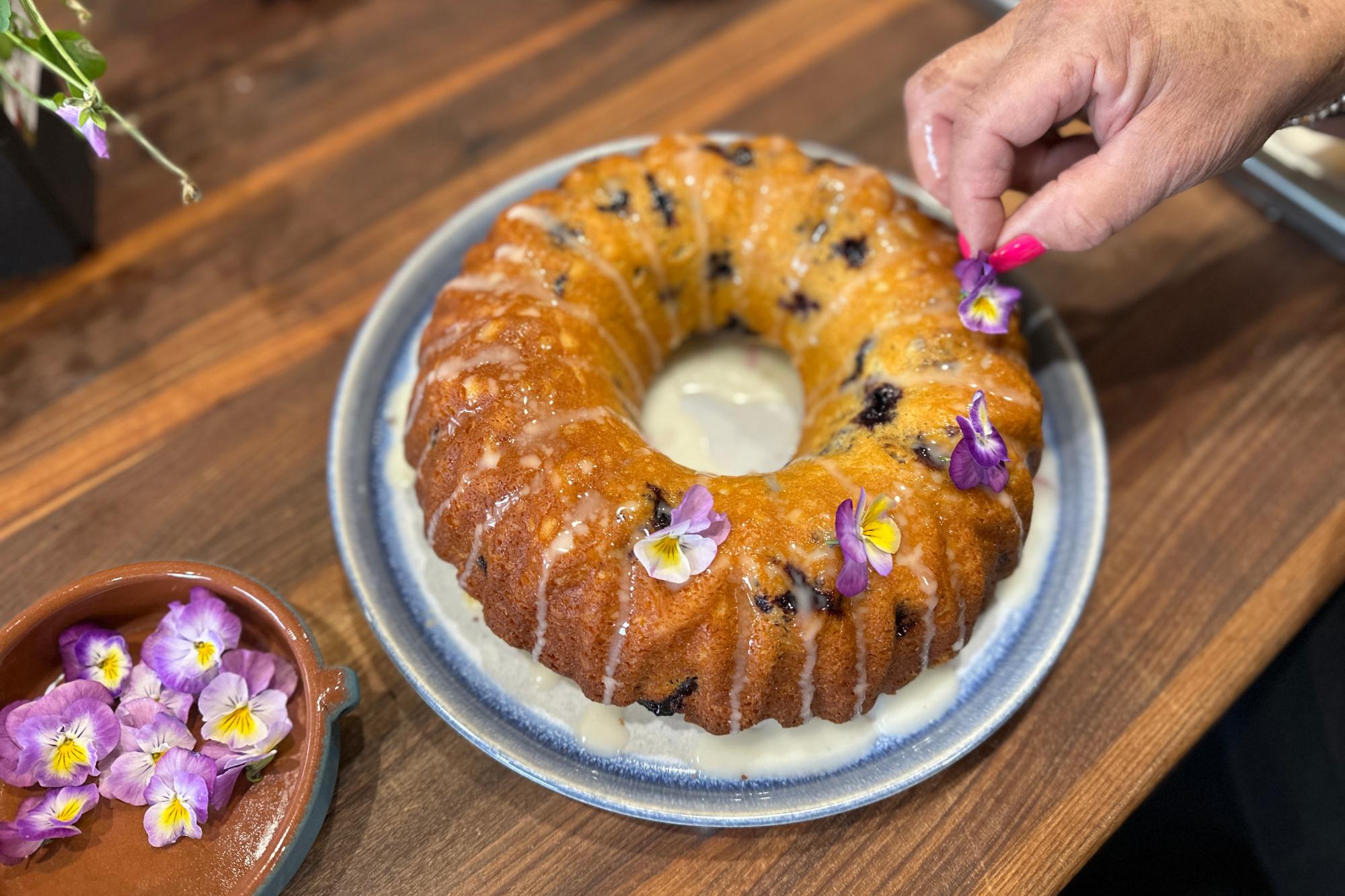 Placing edible flowers.