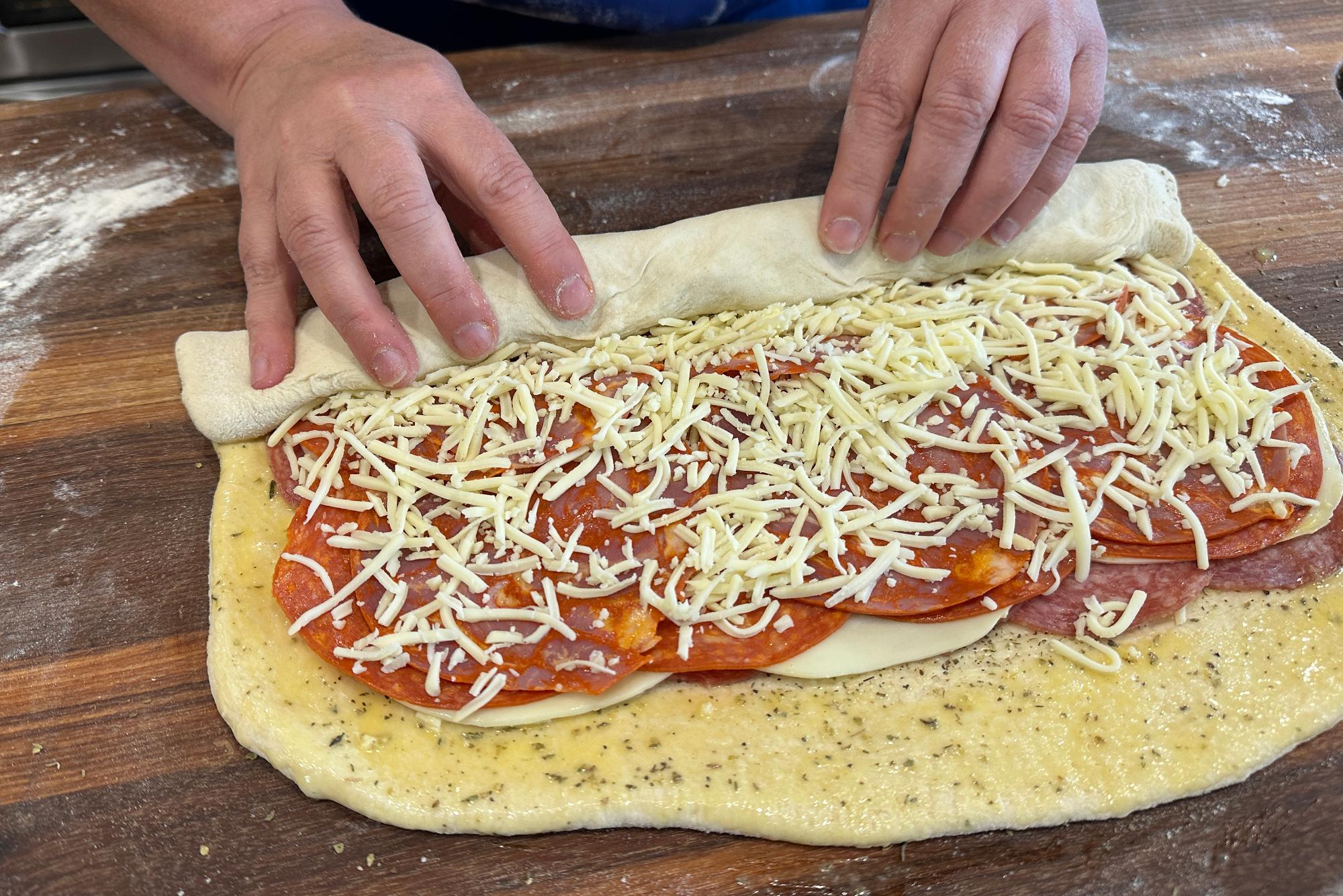 Rolling up the dough.