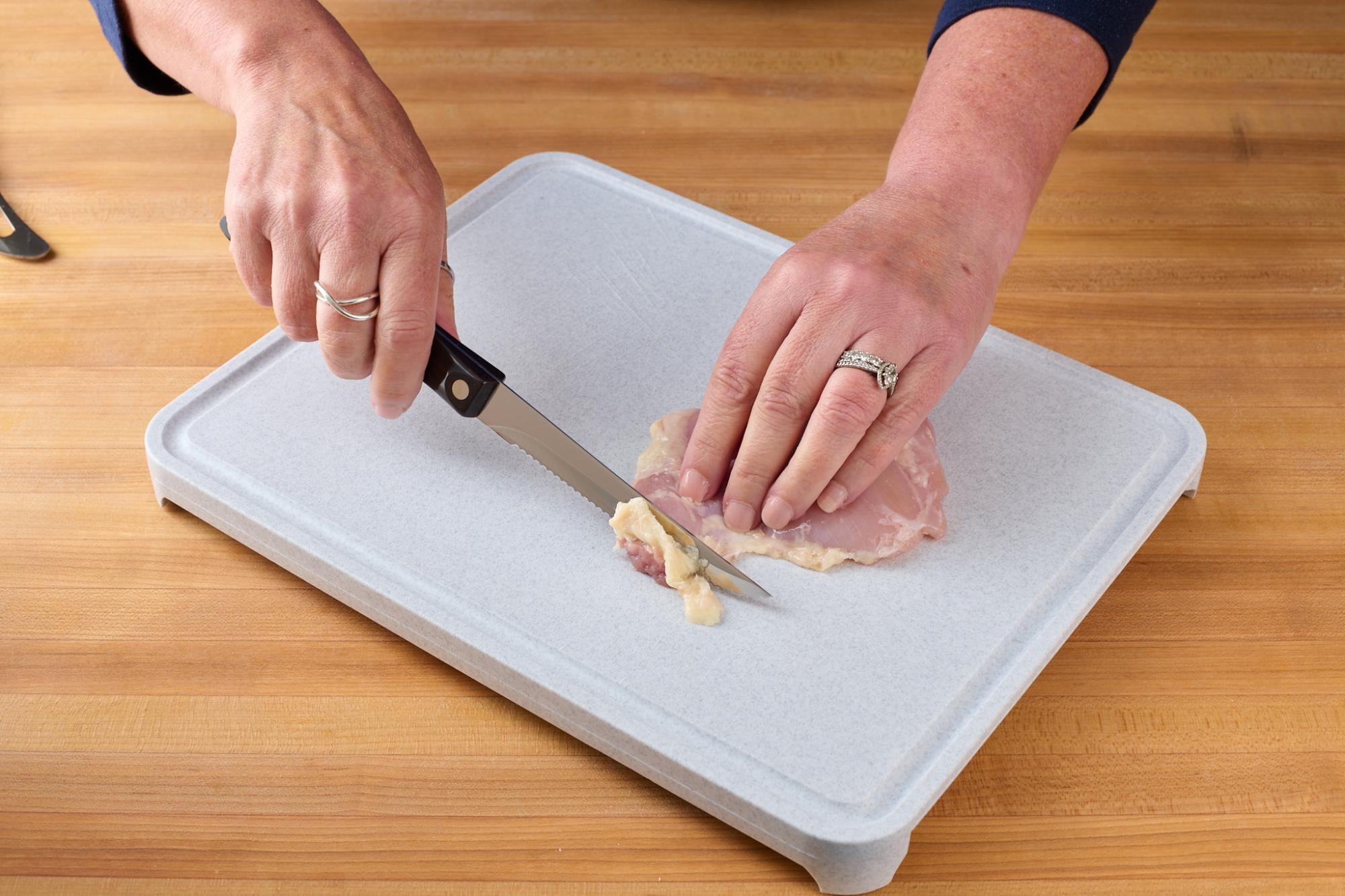 Trimming chicken thighs with Trimmer