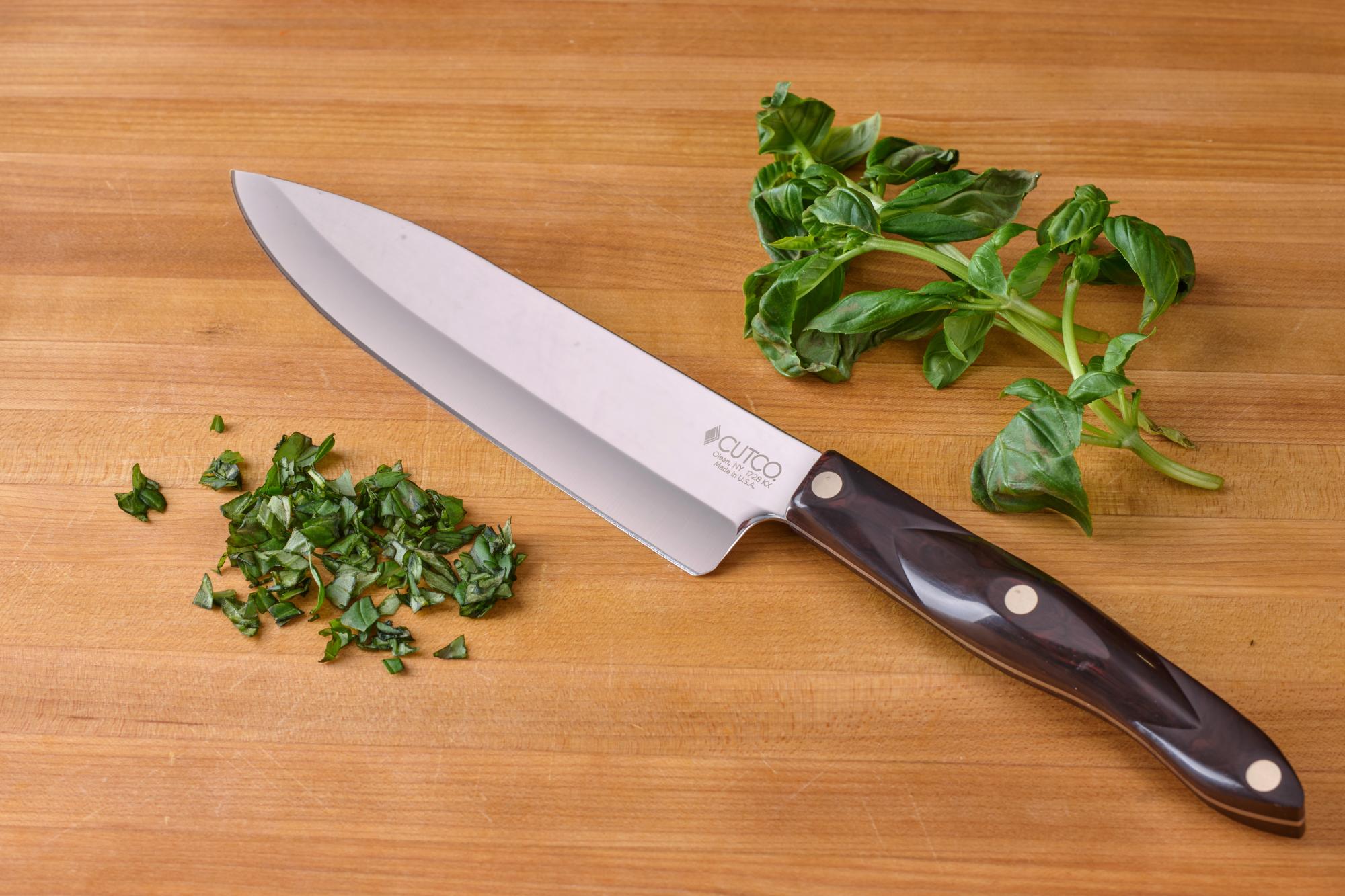 Using a Petite Chef, chop the fresh basil.