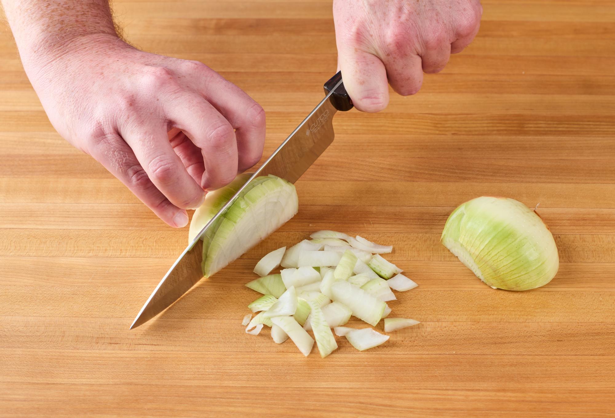 Chopping onion with a Petite Chef.